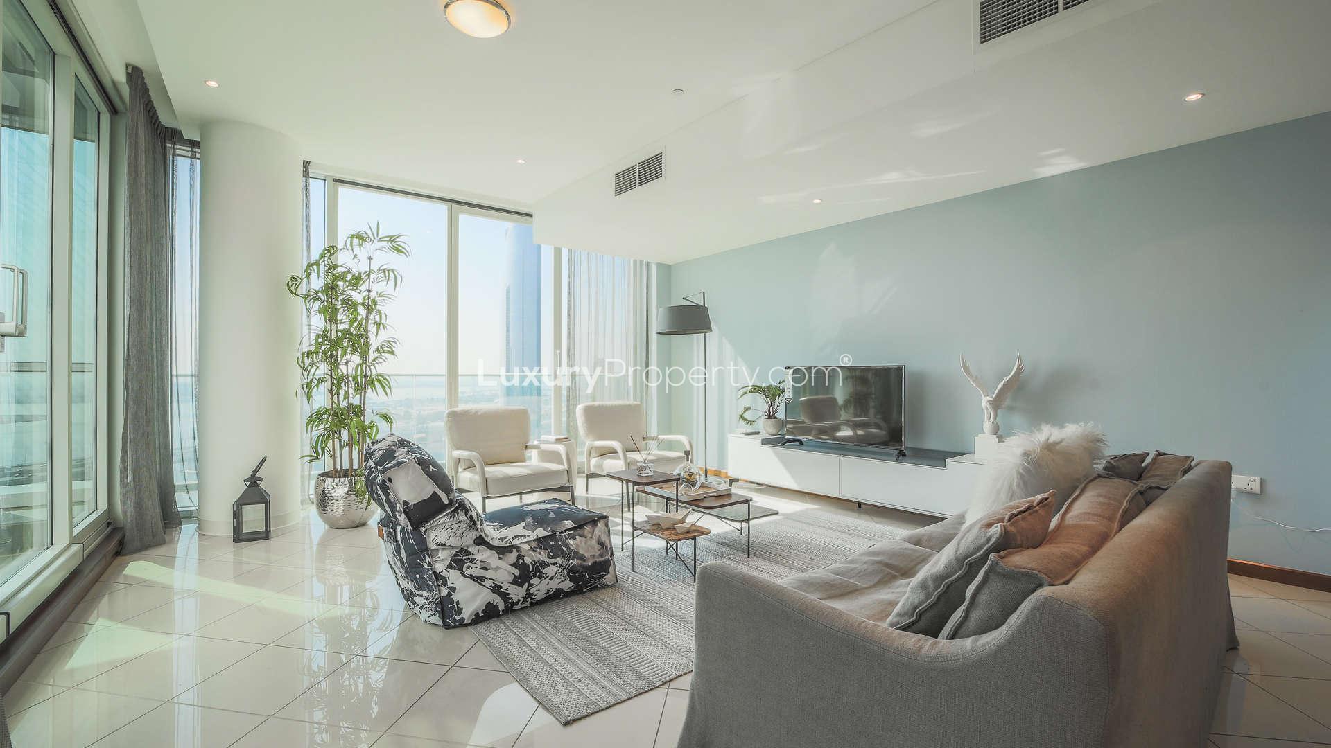 Modern living room and dining area in Marsa Plaza, Dubai Festival City apartment for sale