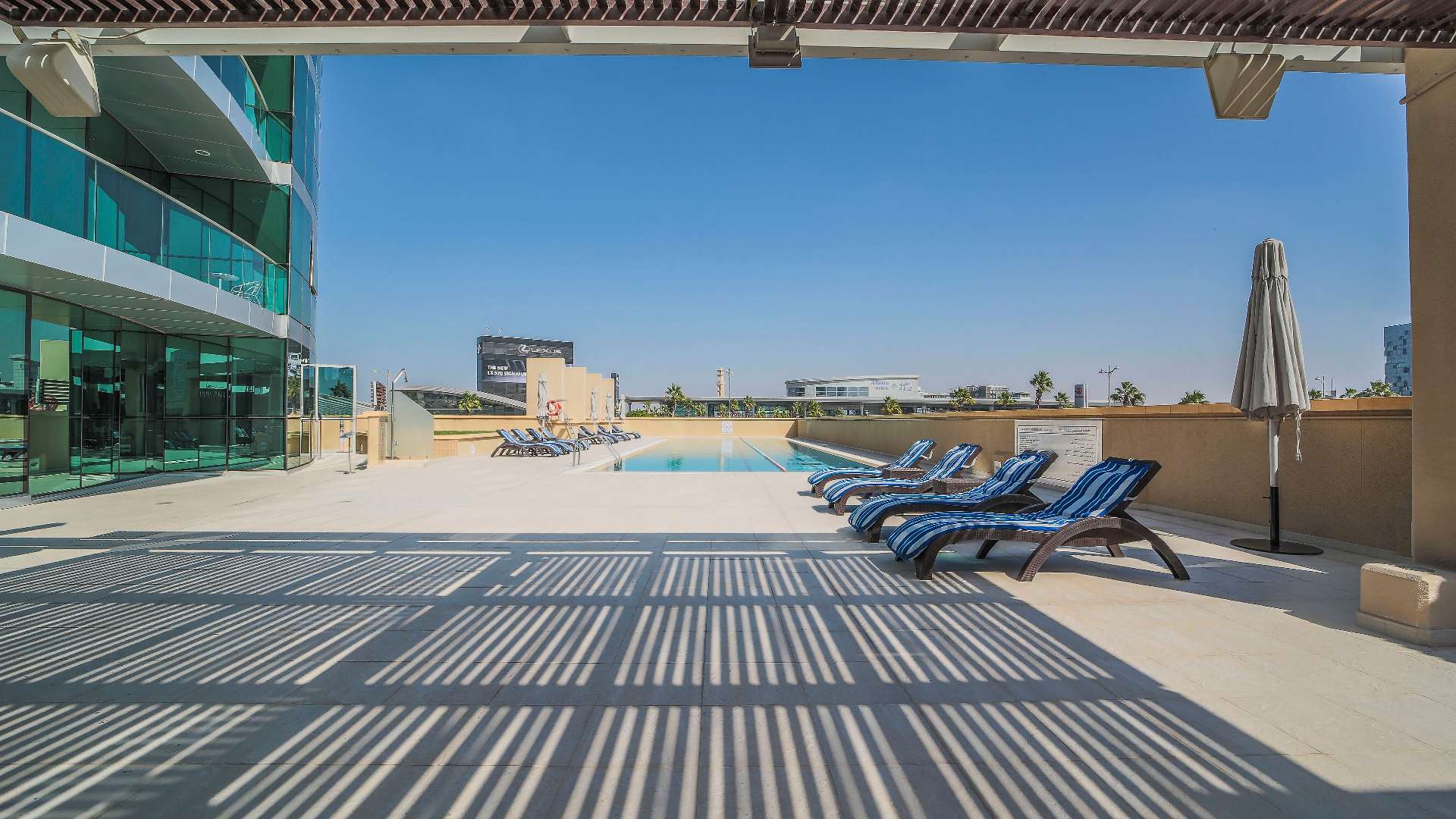 Spacious dining and living area with floor-to-ceiling windows, Marsa Plaza, Dubai Festival City