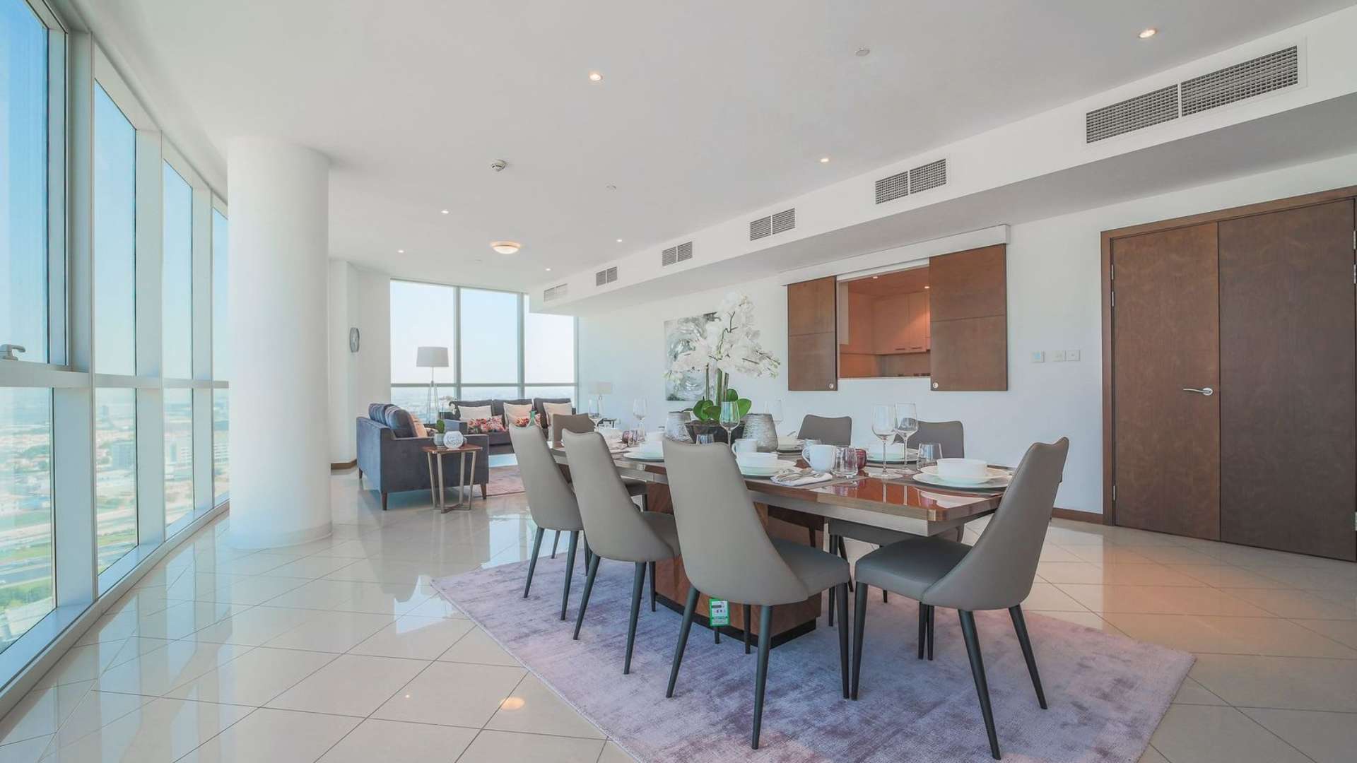 Bright living and dining area in three-bedroom apartment, Marsa Plaza, Dubai Festival City