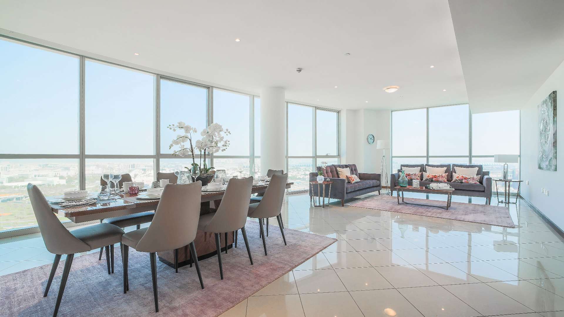 Spacious living room in Dubai Festival City apartment with city views and modern decor