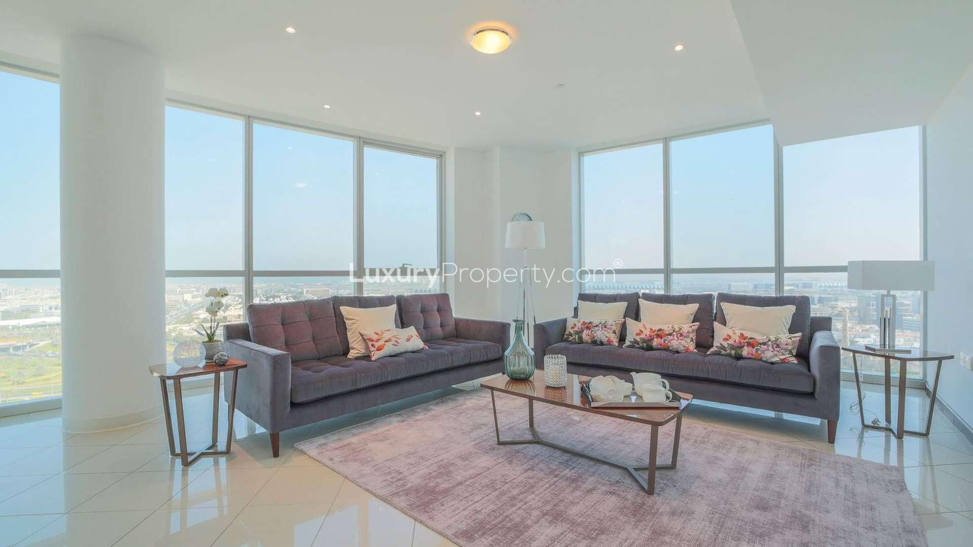 N/A,Bright living room in Marsa Plaza apartment, Dubai Festival City, with modern decor and large windows