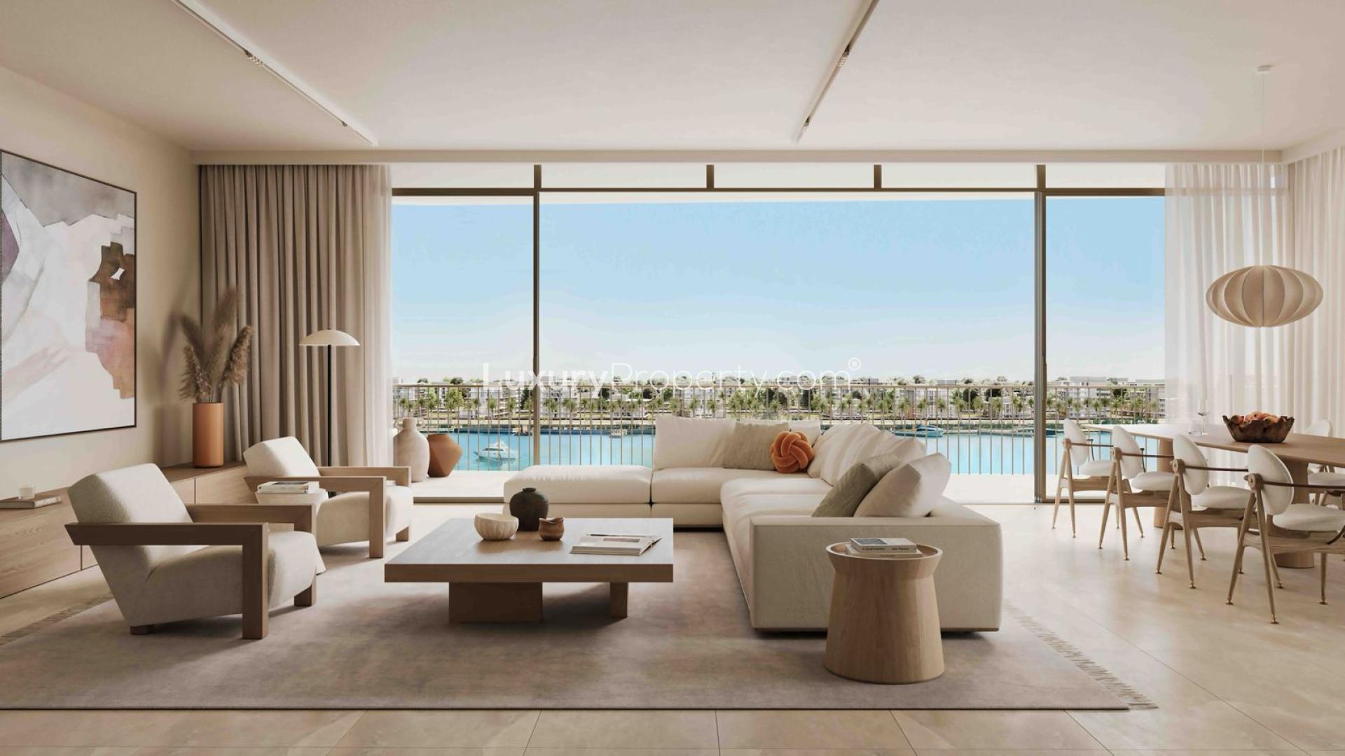 Elegant living room in 3-bedroom apartment, Dubai Islands, with city view balcony