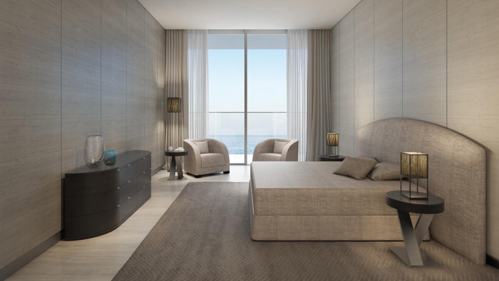 Elegant dining area in Armani Beach Residences apartment, Palm Jumeirah, with ocean view