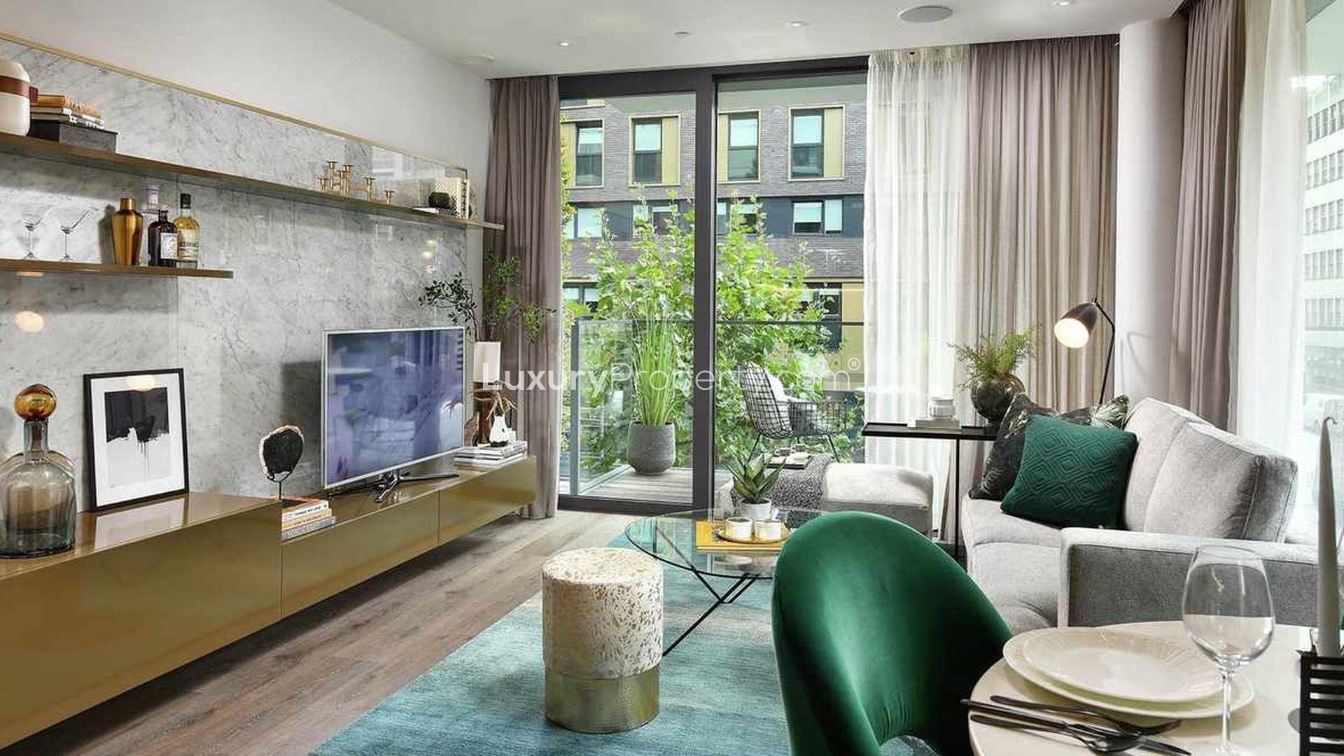 Modern open-plan living room and kitchen in Neroli House, Aldgate apartment for sale