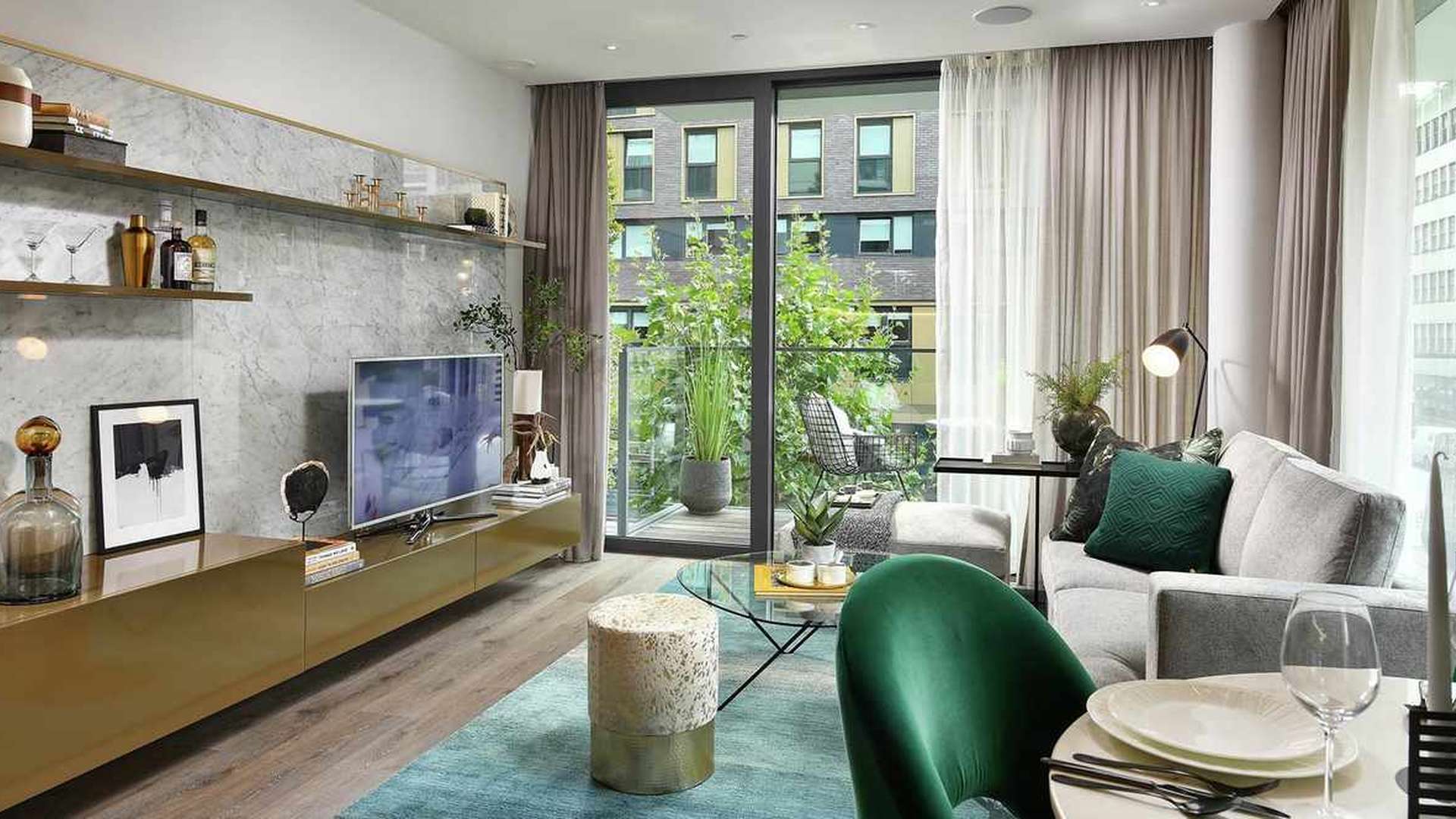 Modern open-plan living room and kitchen in Neroli House, Aldgate apartment for sale