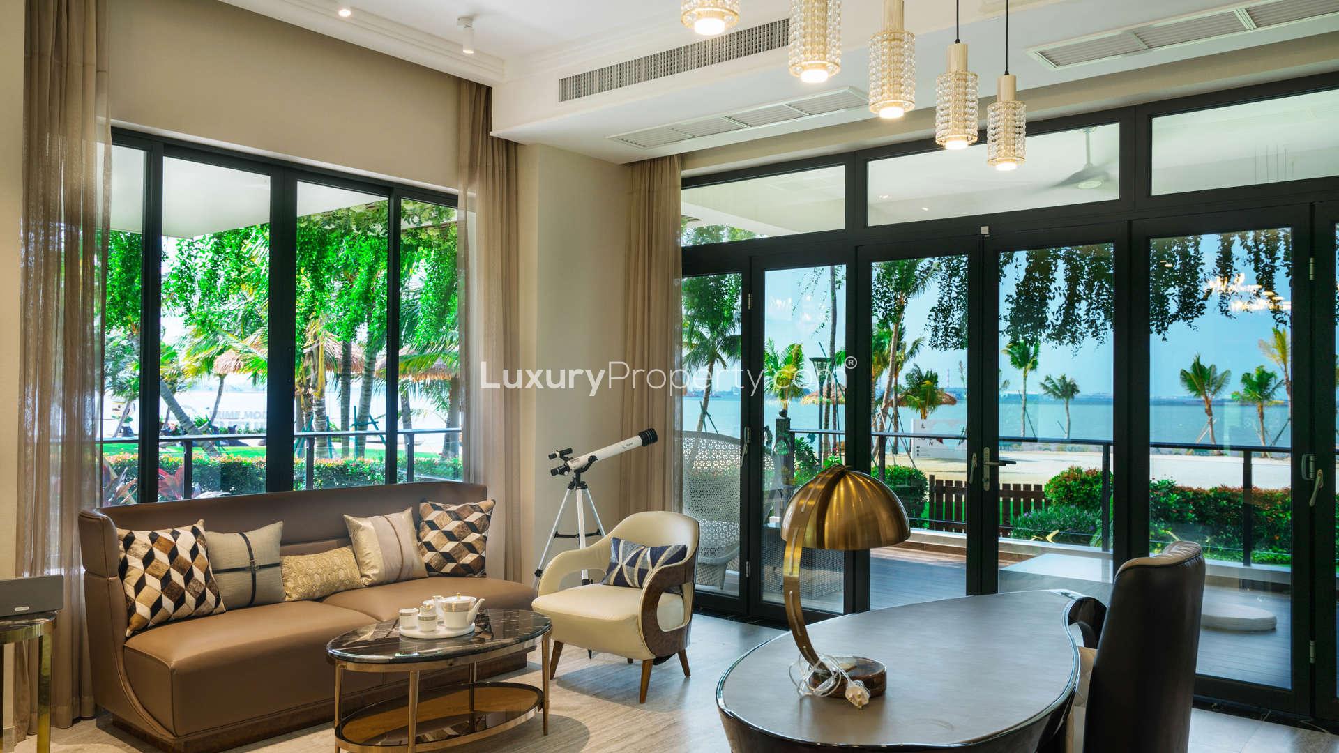 Luxurious living room with pool and sea view in Nigella Park, Forest City apartment