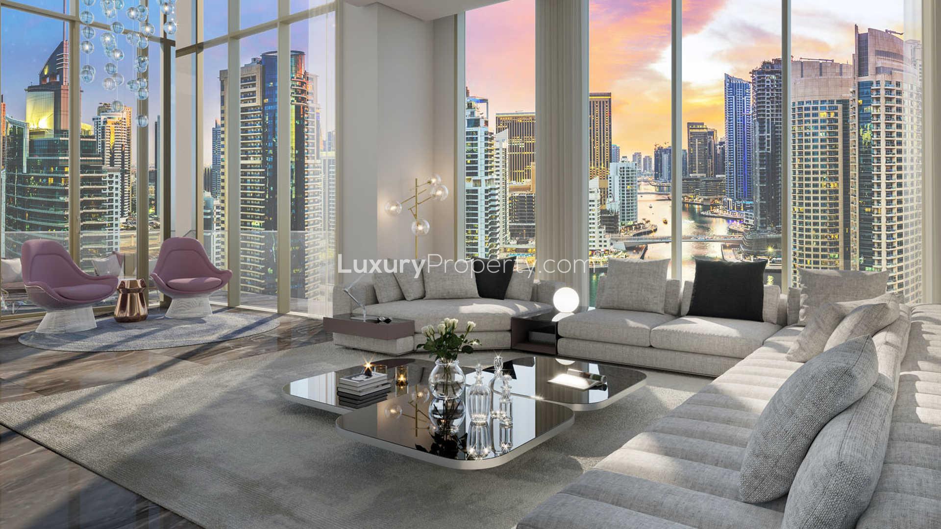 Modern kitchen in 3-bedroom Dubai Marina apartment, featuring sleek cabinetry and dining area