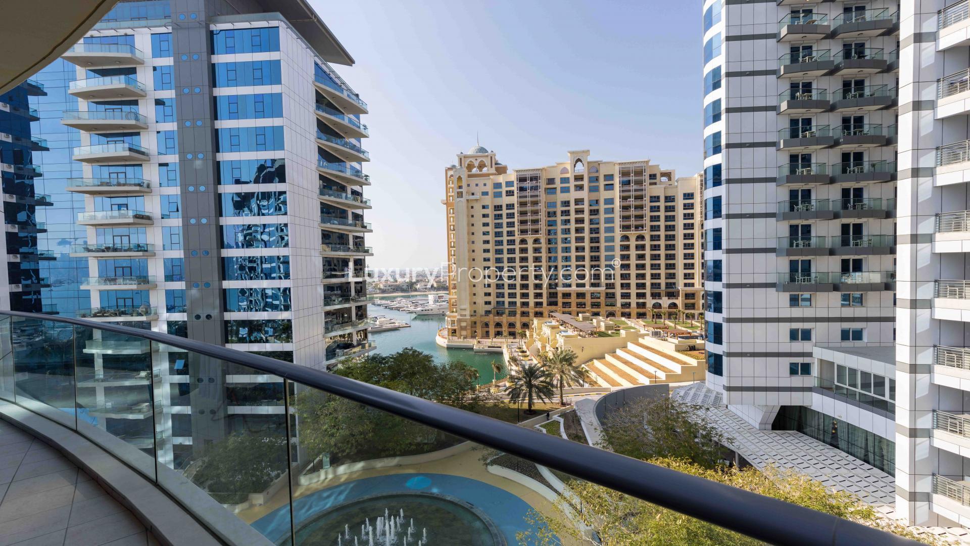 Living room in spacious 3-bed Palm Jumeirah apartment, featuring elegant decor and natural light