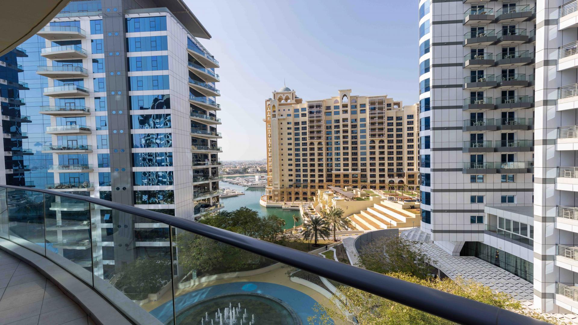 Living room in spacious 3-bed Palm Jumeirah apartment, featuring elegant decor and natural light