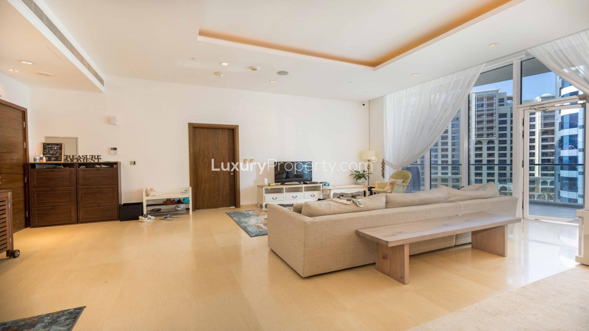 Balcony view from Oceana apartment, showcasing partial sea views and surrounding buildings, Palm Jumeirah