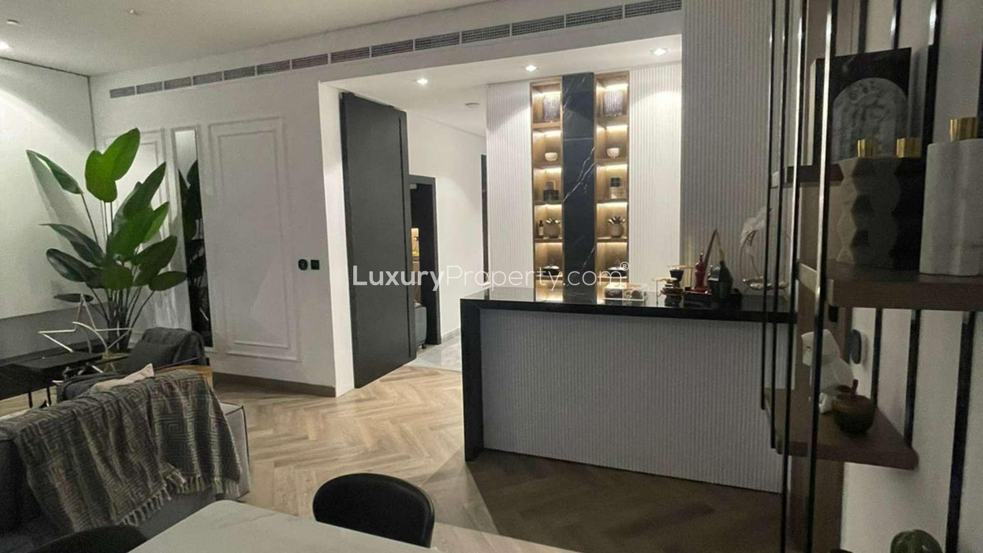 Luxurious Palm Jumeirah apartment balcony with marina view at sunset, Oceana community