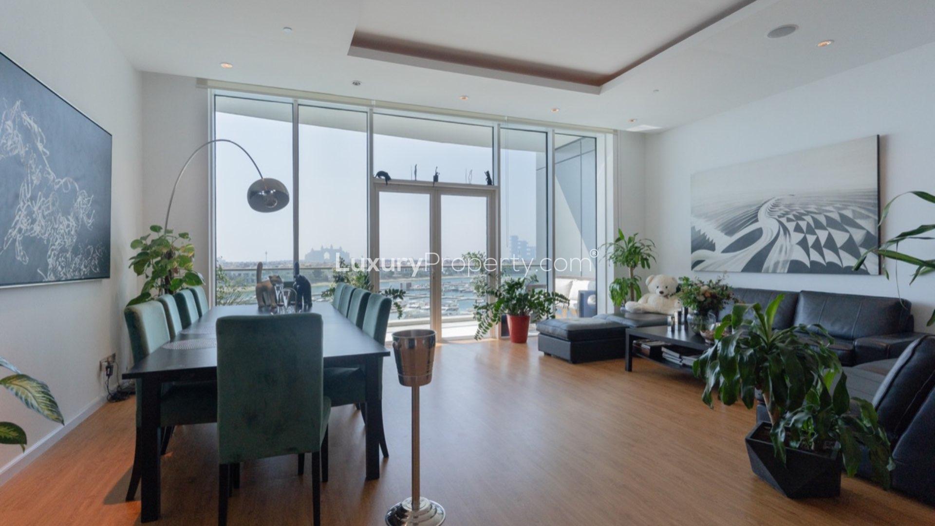 Modern kitchen and dining area with sea view in Oceana Pacific apartment, Palm Jumeirah