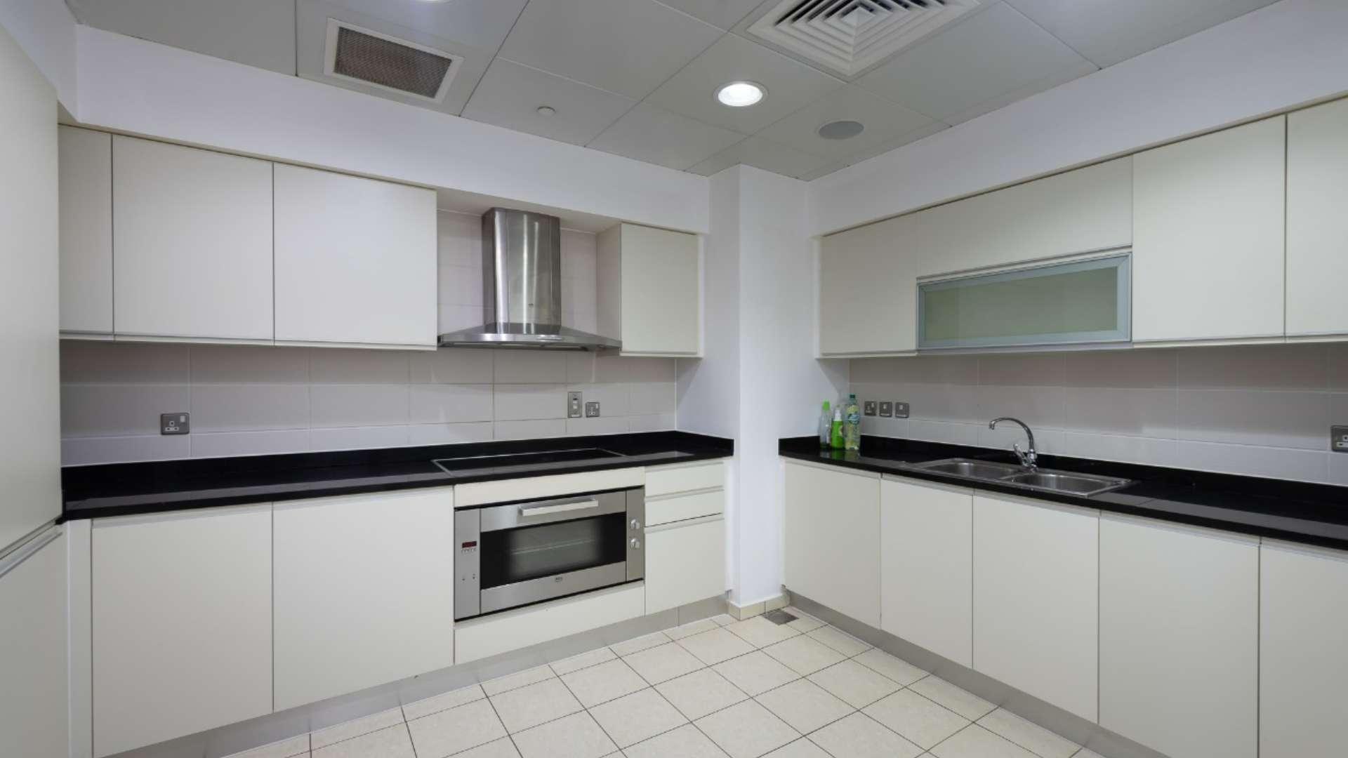 N/A,Spacious living room in 3-bedroom apartment, Oceana, Palm Jumeirah, featuring modern decor and lighting