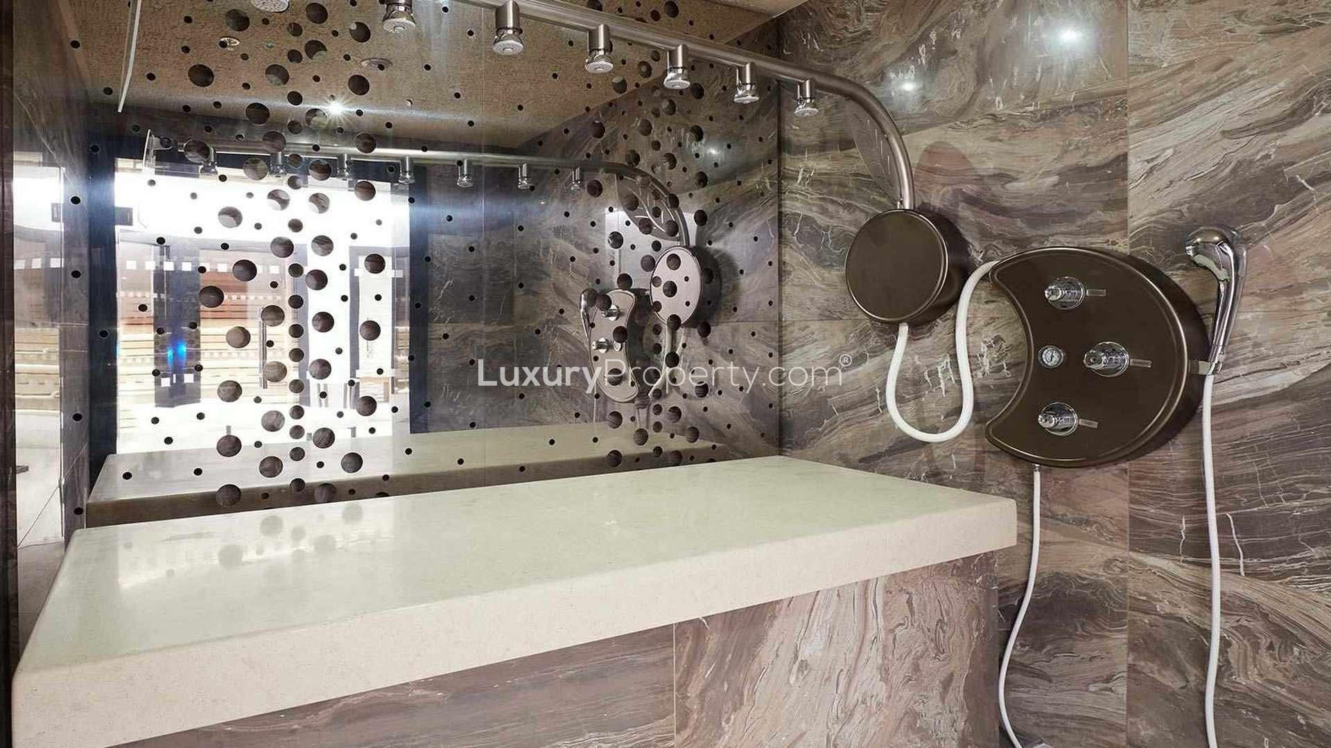 Luxurious open-plan living area in One Blackfriars, Southwark apartment, featuring modern kitchen