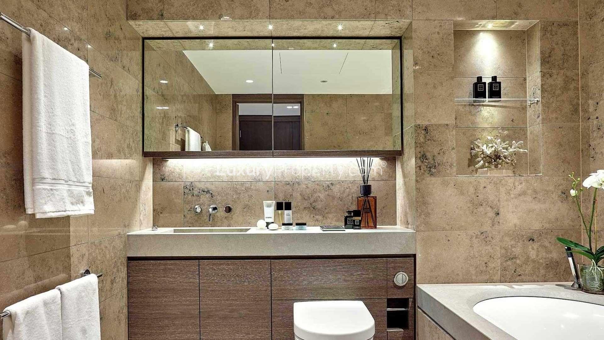 Hallway with modern art in luxury One Blackfriars apartment, Southwark, London