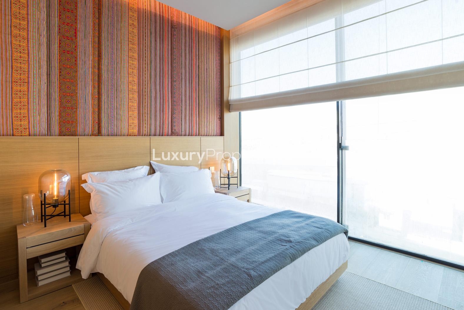 Luxurious bedroom in three-bedroom apartment, One Palm, Palm Jumeirah, with elegant decor