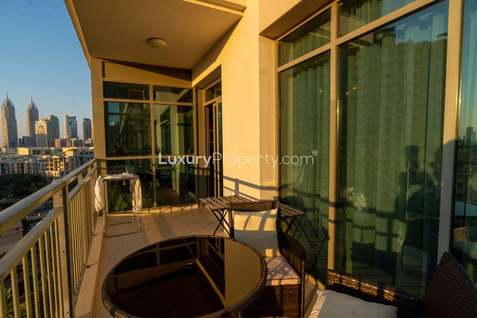 Sunset view from balcony of 3-bedroom triplex apartment in Panorama, The Views