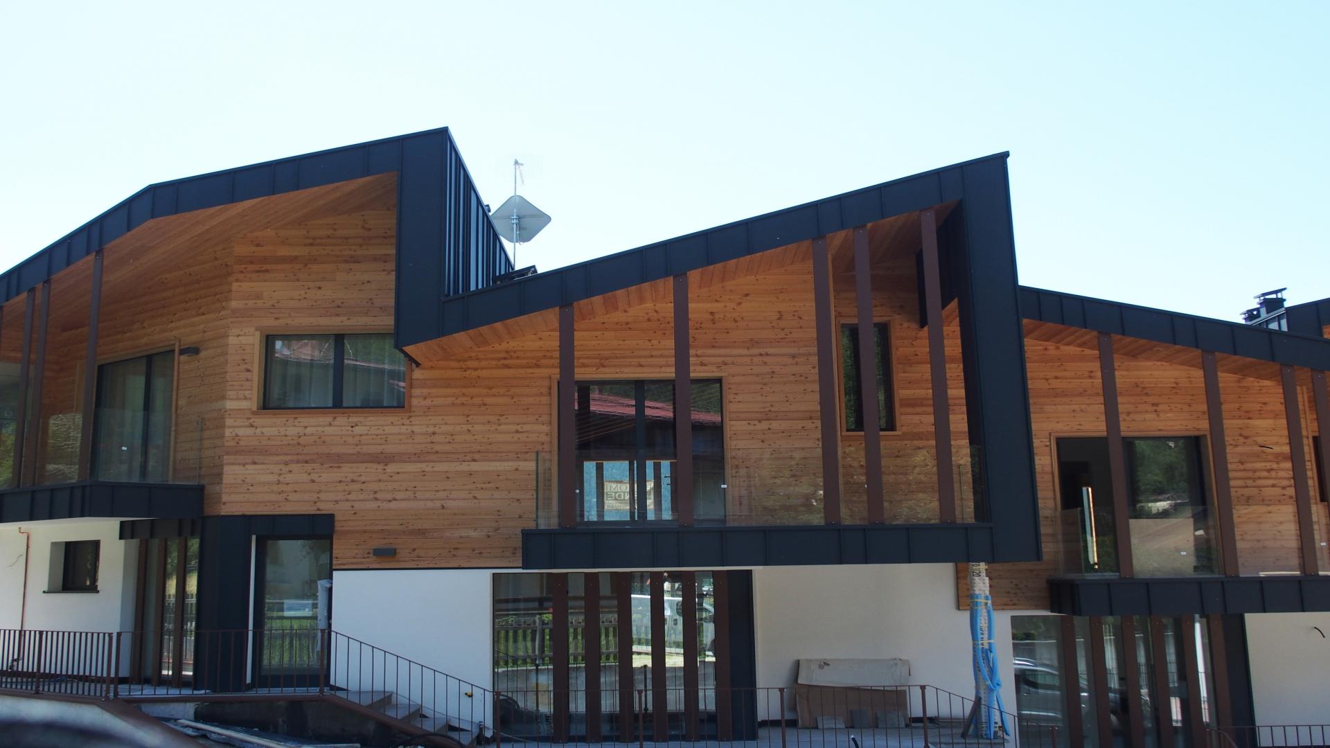 Modern three-bedroom chalet exterior in Pinzolo, Trentino, Italy, for sale residential property