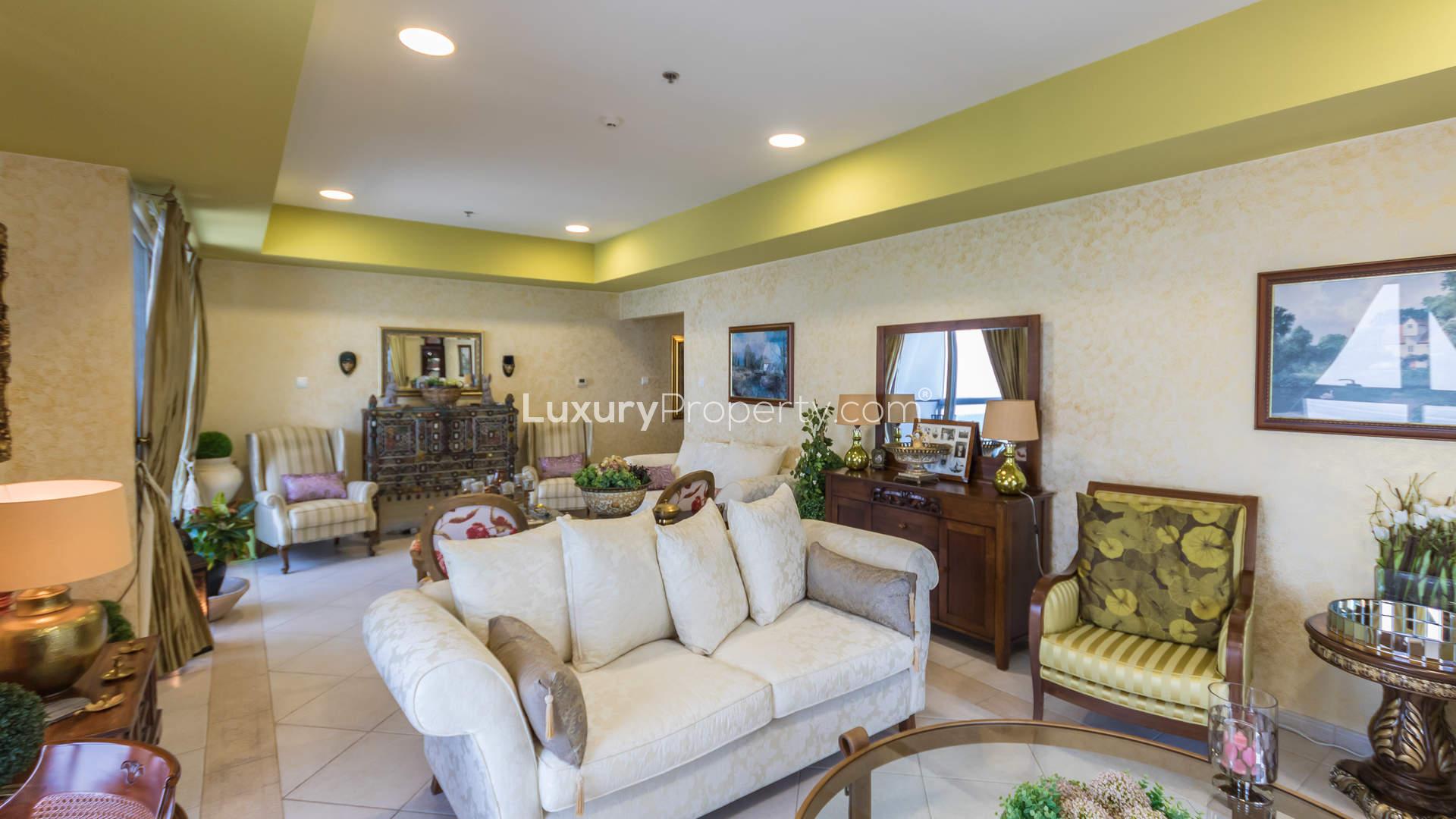 Living room in Princess Tower apartment, Dubai Marina, with sea views and elegant decor