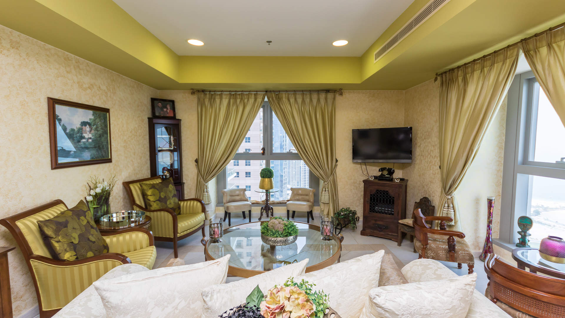 Luxurious living room in Dubai Marina's Princess Tower apartment with elegant decor