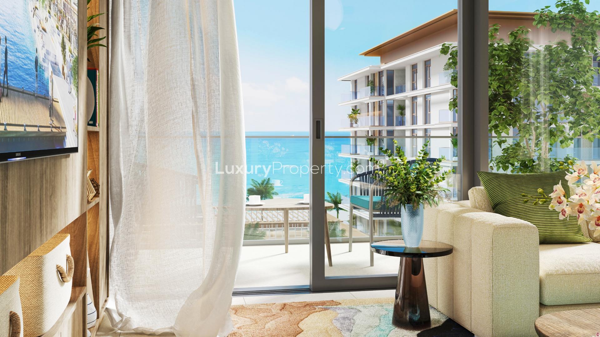 Aerial view of Mina Rashid Seascape apartment complex with marina and waterfront scenery