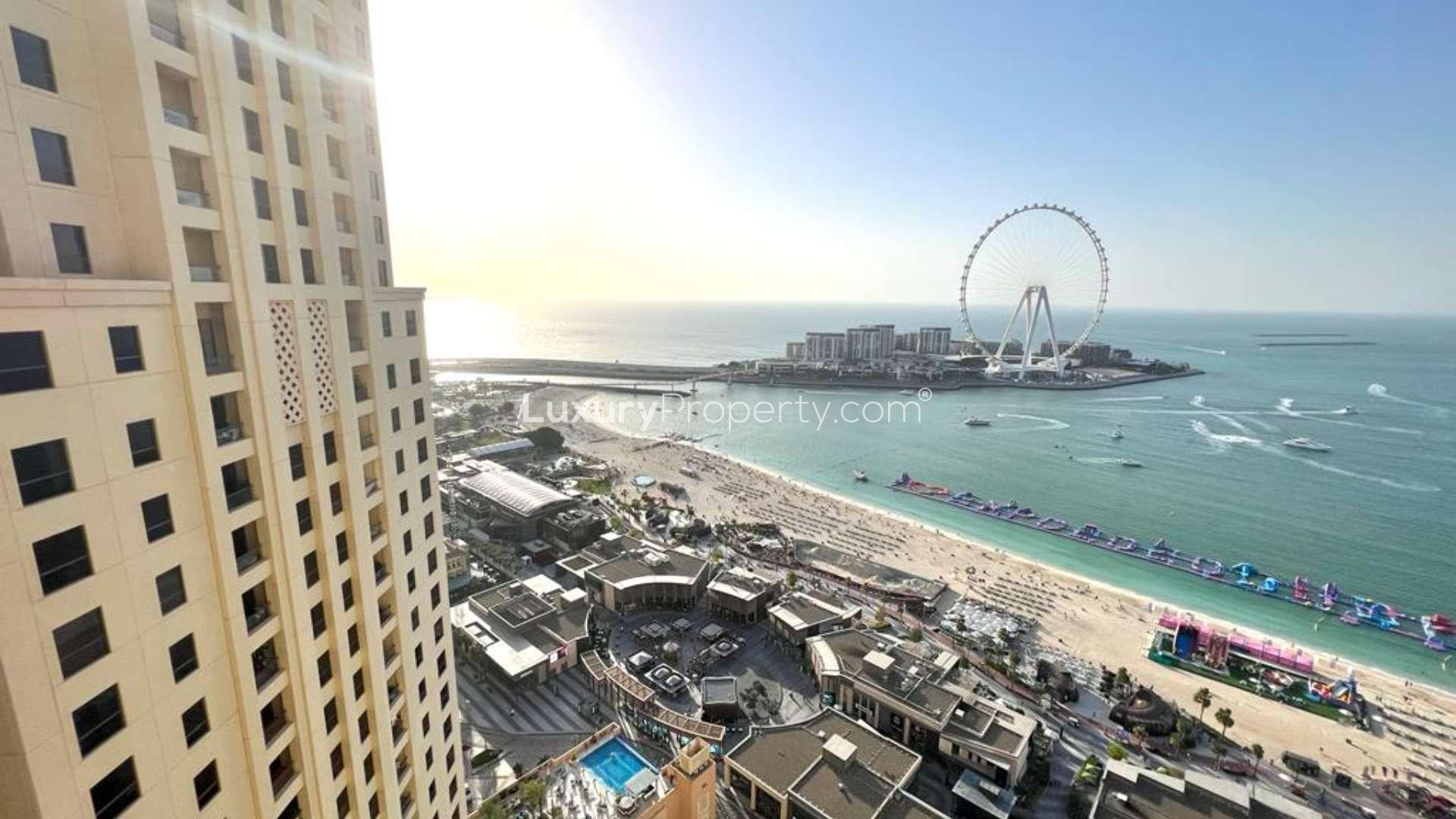Beachfront view from 3-bedroom apartment in Rimal 5, JBR, overlooking sea and Ferris wheel