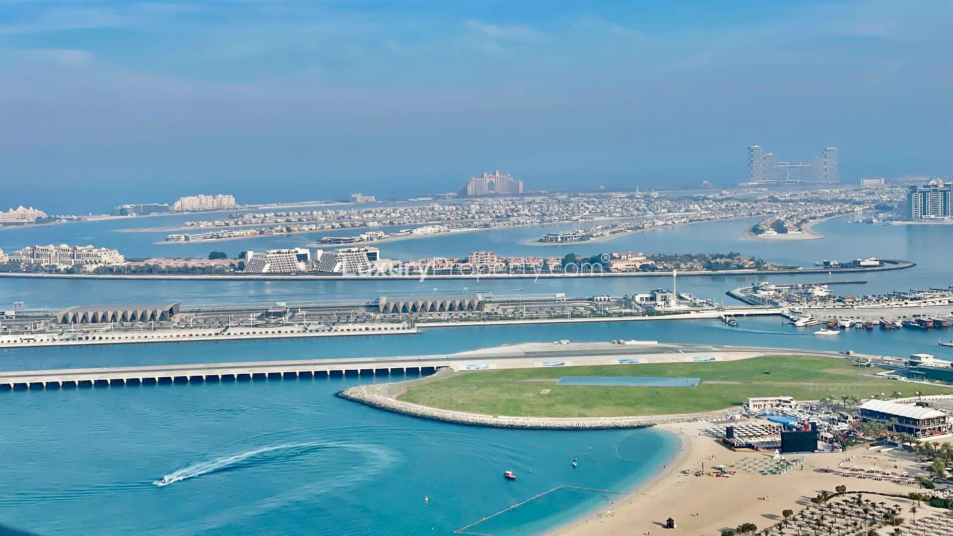 Luxurious terrace with seating area and city views in Jumeirah Beach Residence apartment