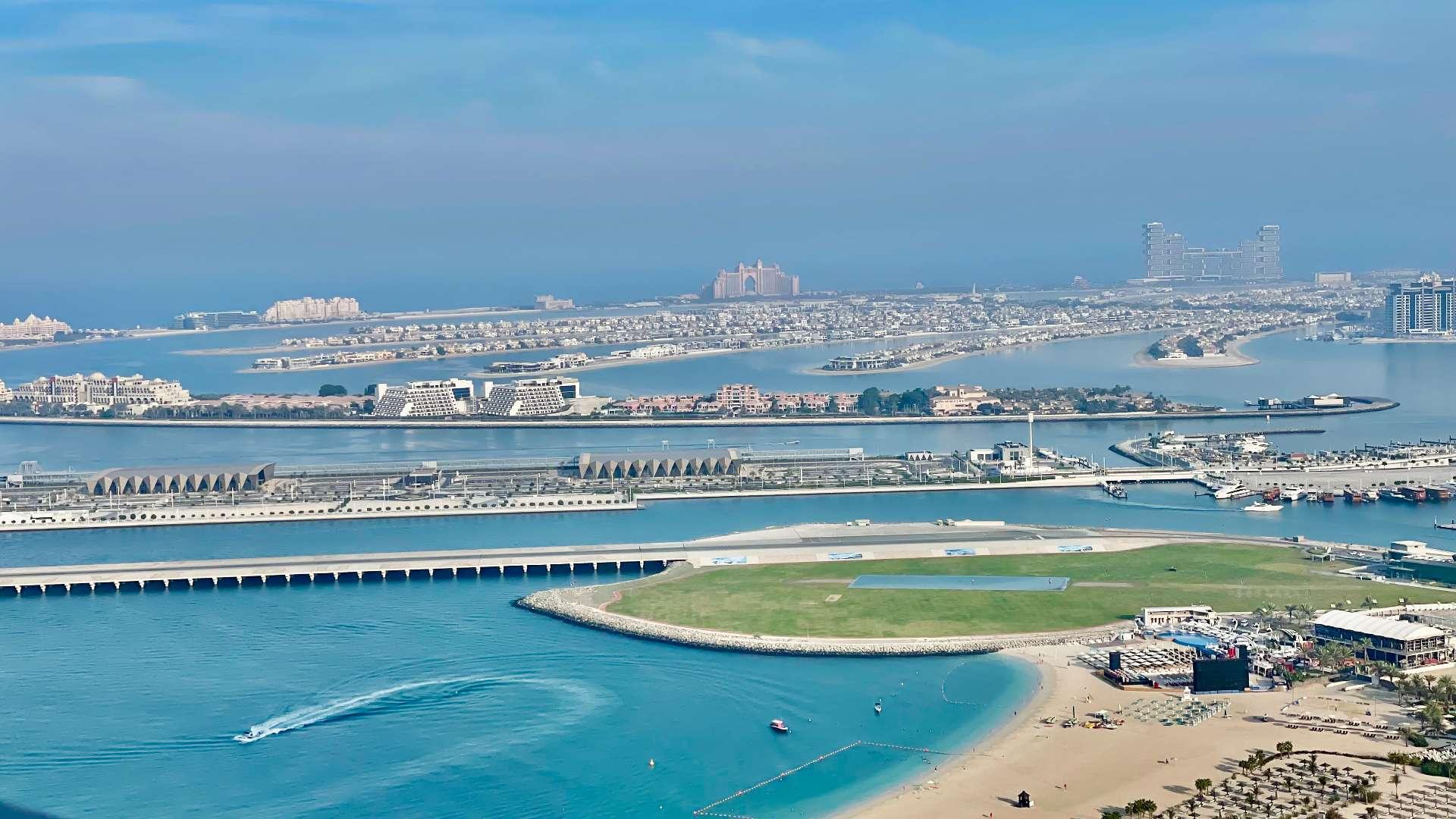 Luxurious terrace with seating area and city views in Jumeirah Beach Residence apartment