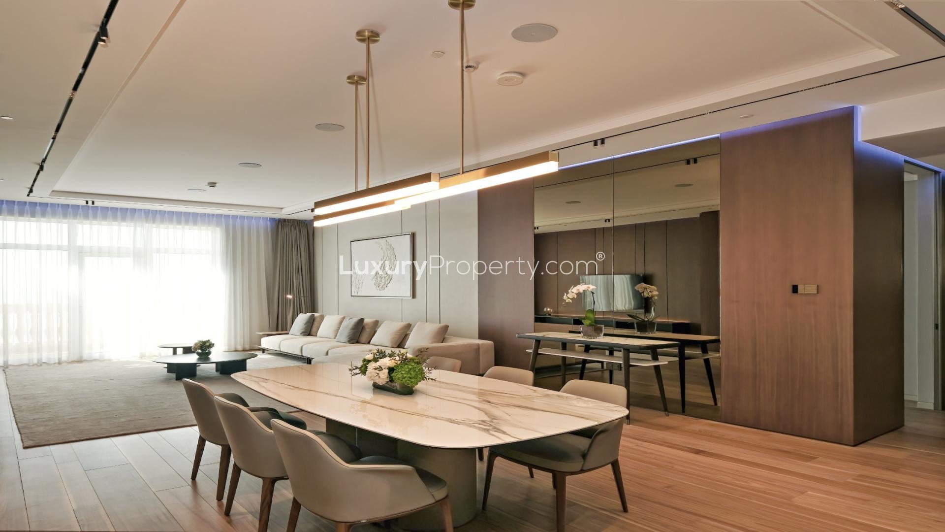 Luxurious dining and living area in 3-bedroom apartment, Raffles Residences, Palm Jumeirah