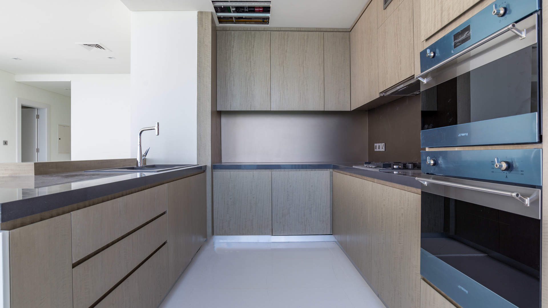 Modern kitchen with stunning sea view in Palm Jumeirah penthouse apartment, Dubai