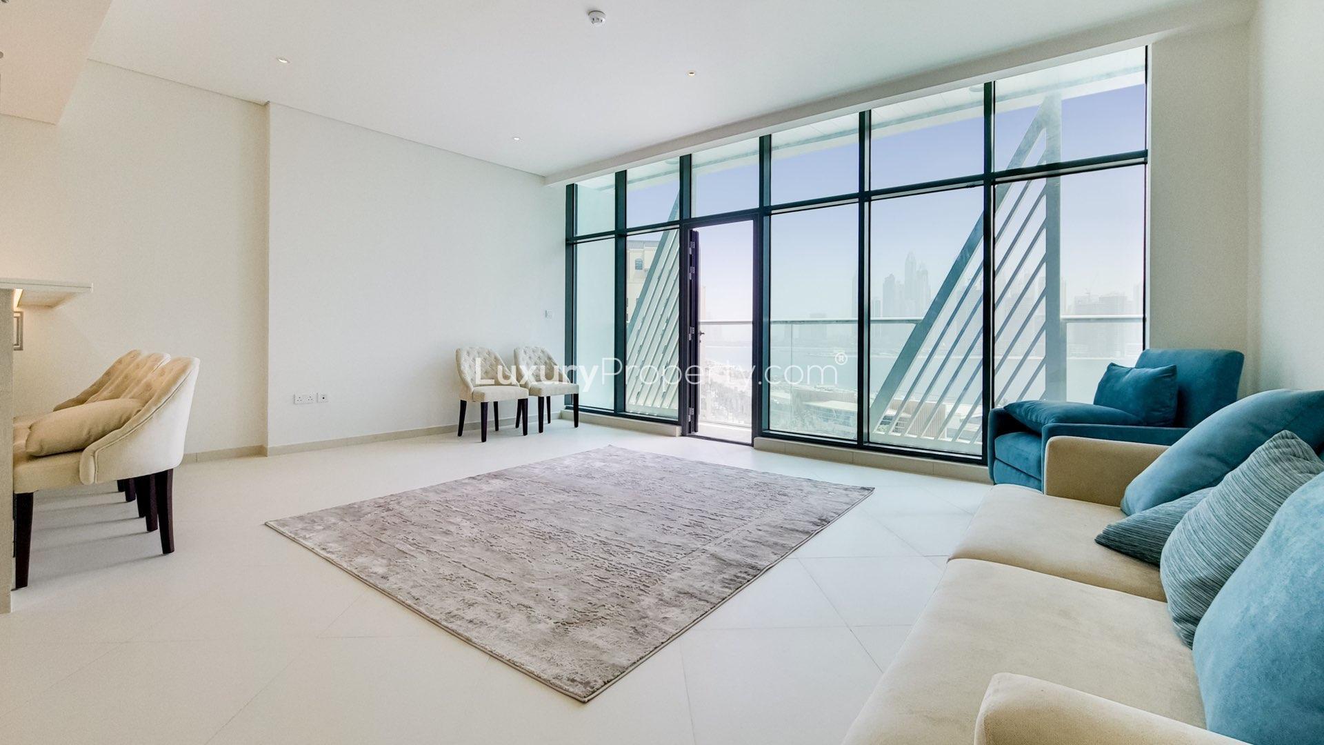 Furnished apartment view in Palm Jumeirah, Seven Palm, overlooking Dubai skyline and waterfront