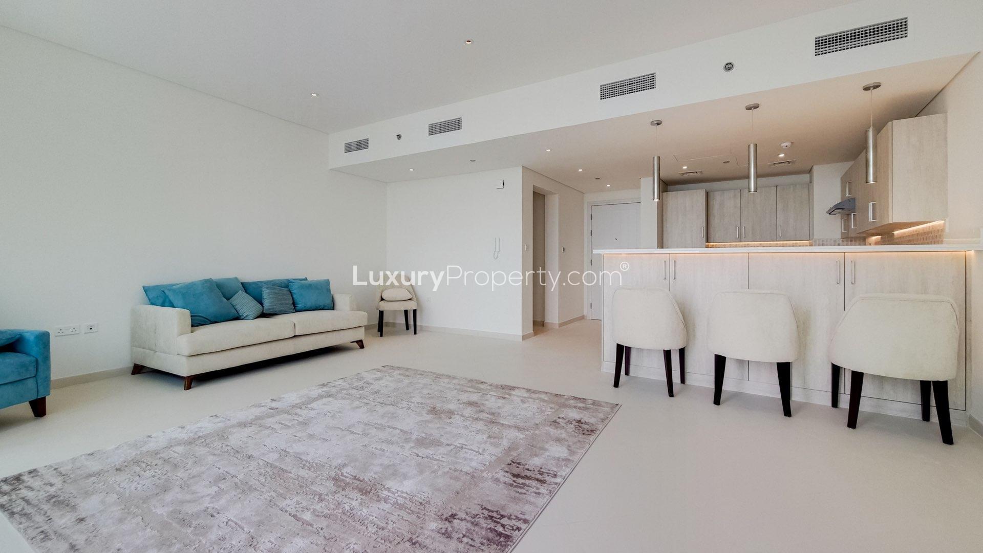 Balcony view from furnished apartment in Seven Palm, Palm Jumeirah, showcasing skyline and sea