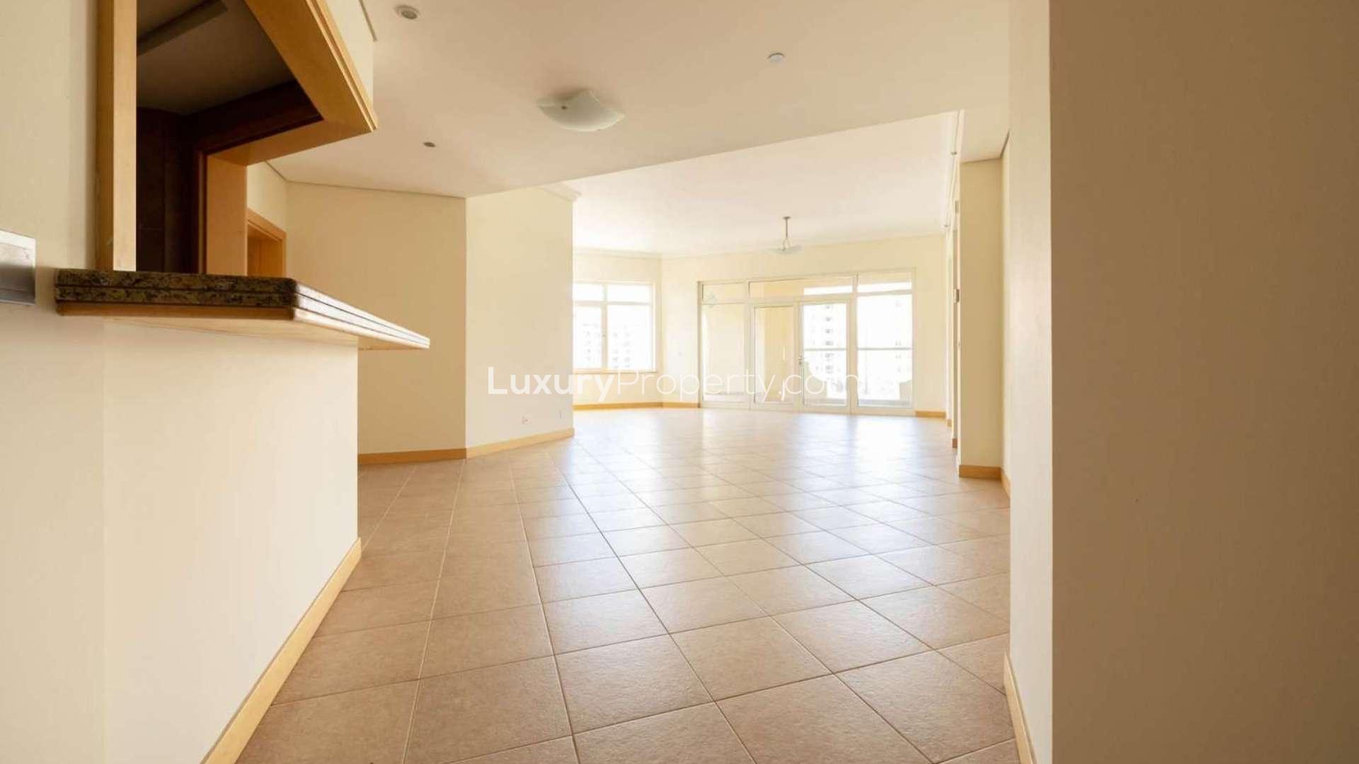 Spacious wooden walk-in closet in 3-bedroom apartment, Shoreline, Palm Jumeirah