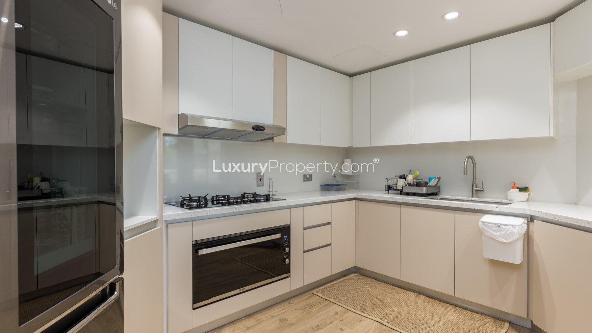 Living room in upgraded Palm Jumeirah apartment with modern decor and natural light