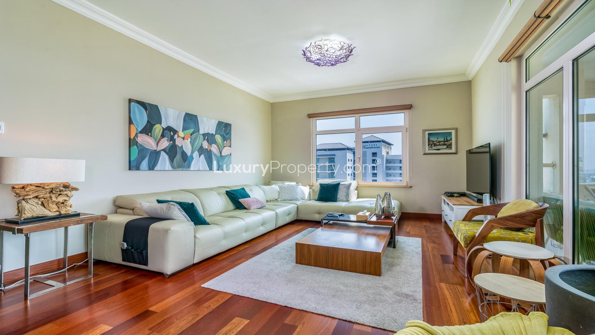 High floor apartment living room in Shoreline Apartments, Palm Jumeirah with modern decor and sea views