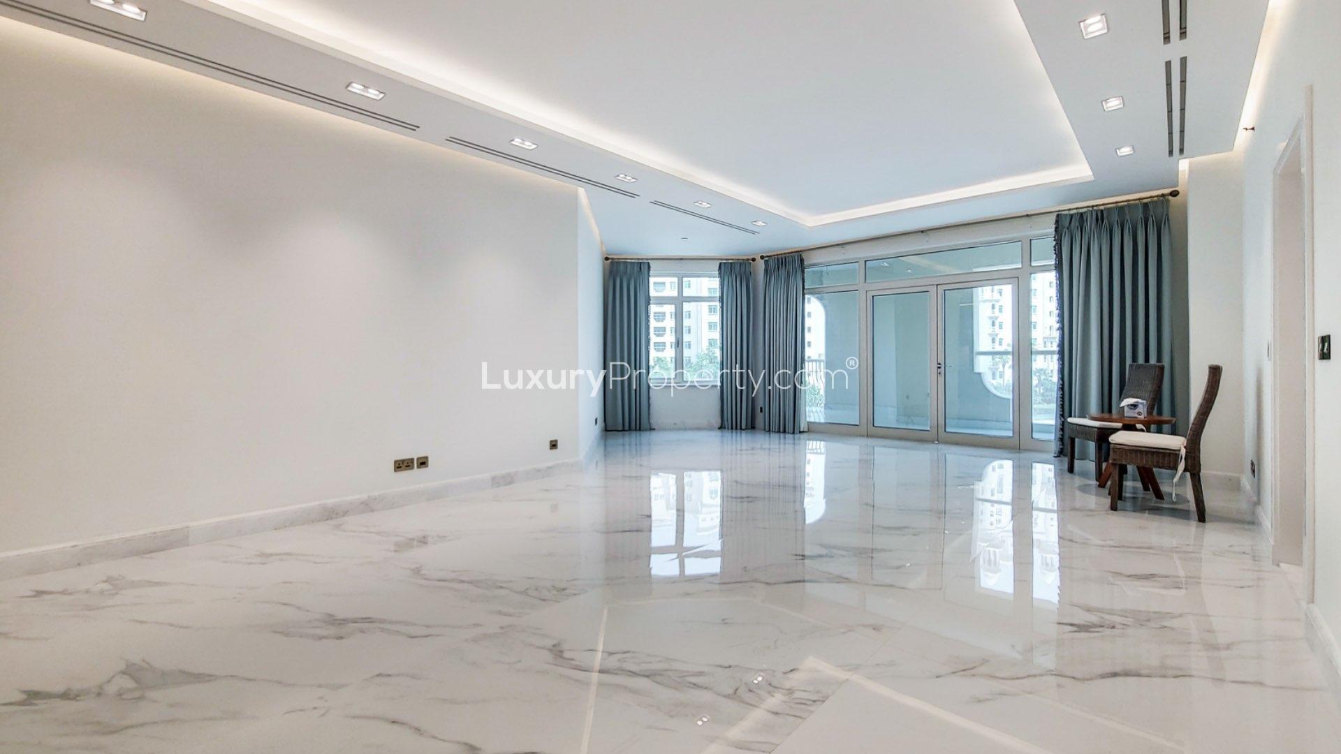 Modern kitchen with marble countertops in upgraded Shoreline Apartment, Palm Jumeirah