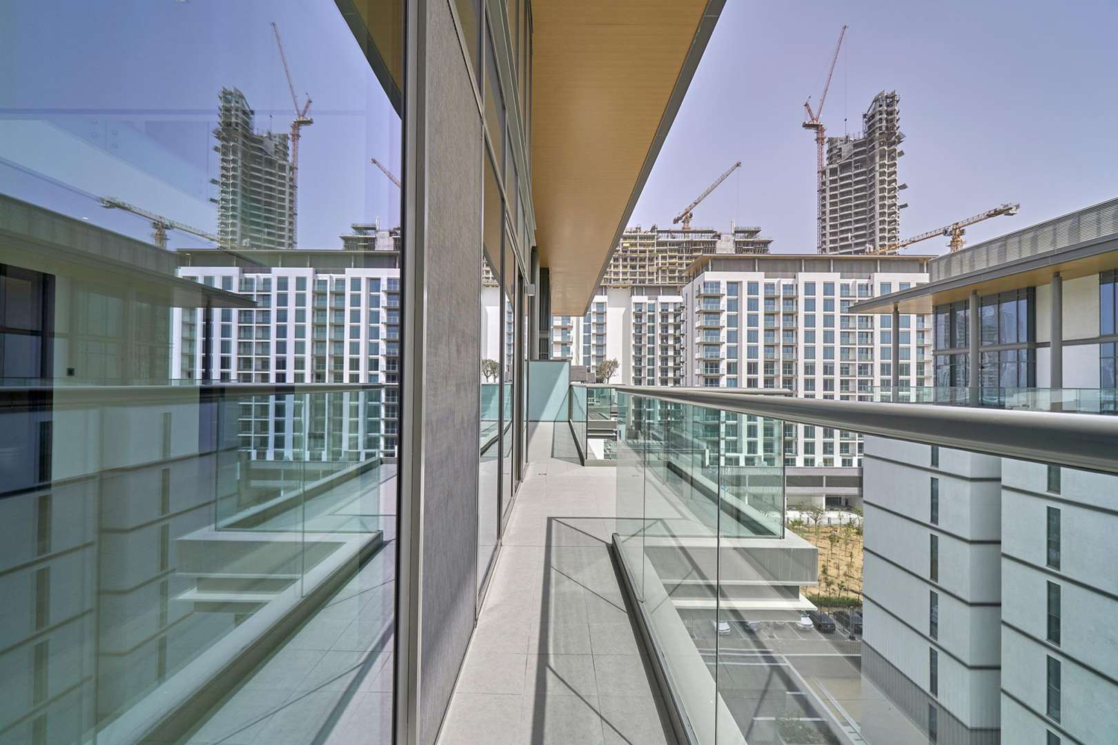 Modern apartment complex courtyard in Hartland Greens, Sobha Hartland, Mohammed Bin Rashid City