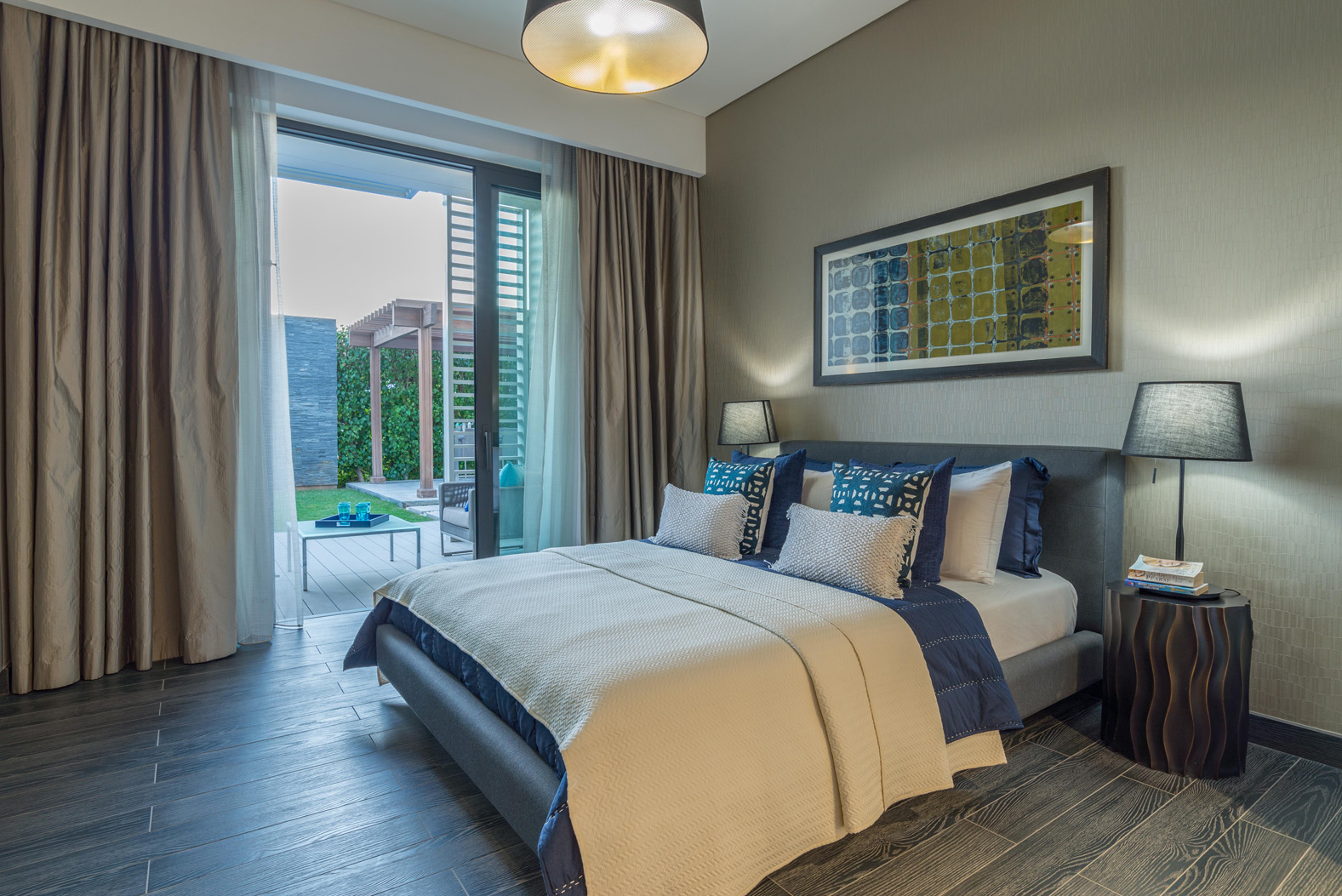 Modern bedroom in Sobha Hartland Greens duplex, featuring stylish decor and cozy ambiance