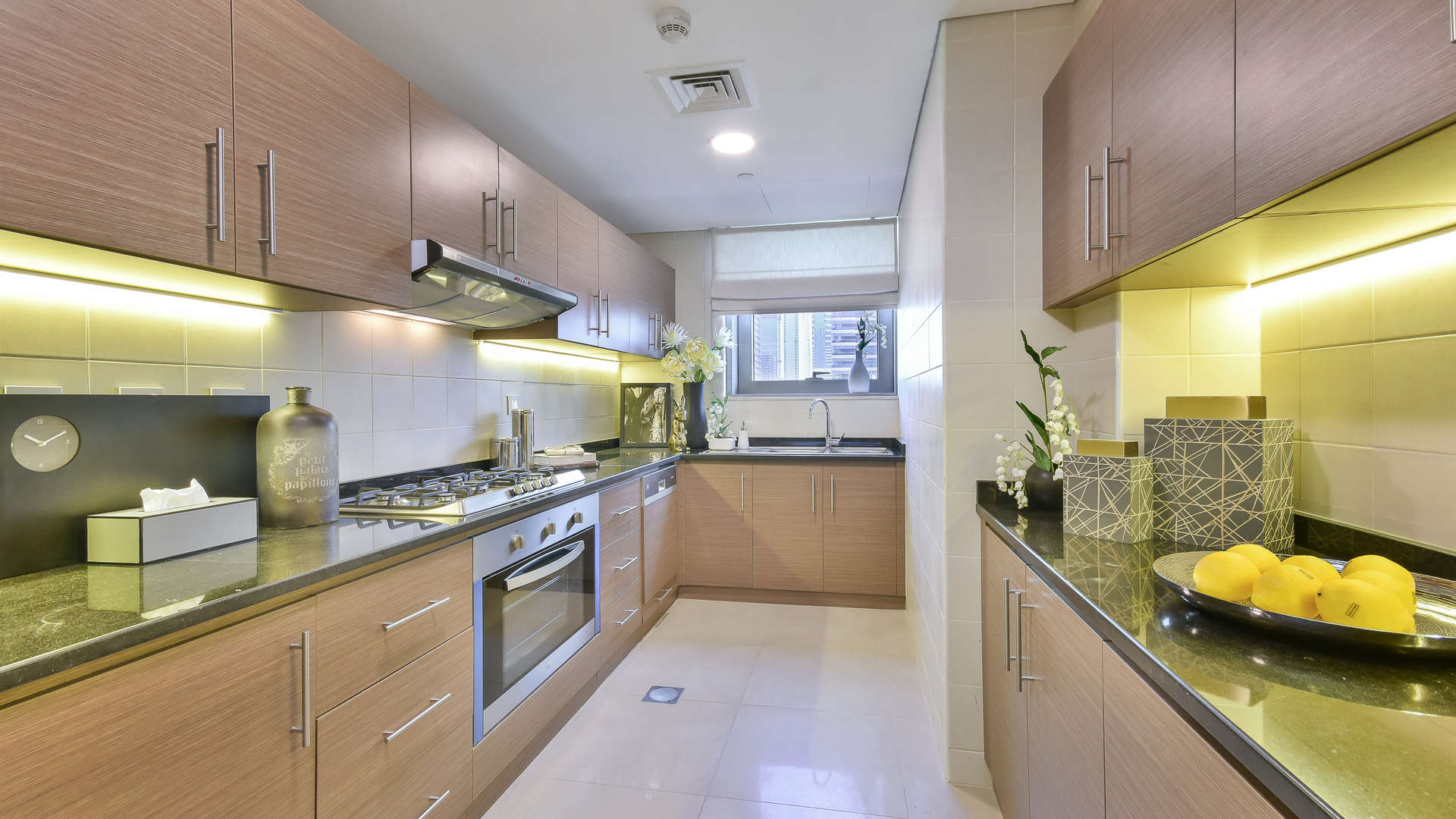 Modern kitchen in 2-bedroom apartment, Sparkle Towers, Dubai Marina, featuring sleek cabinetry