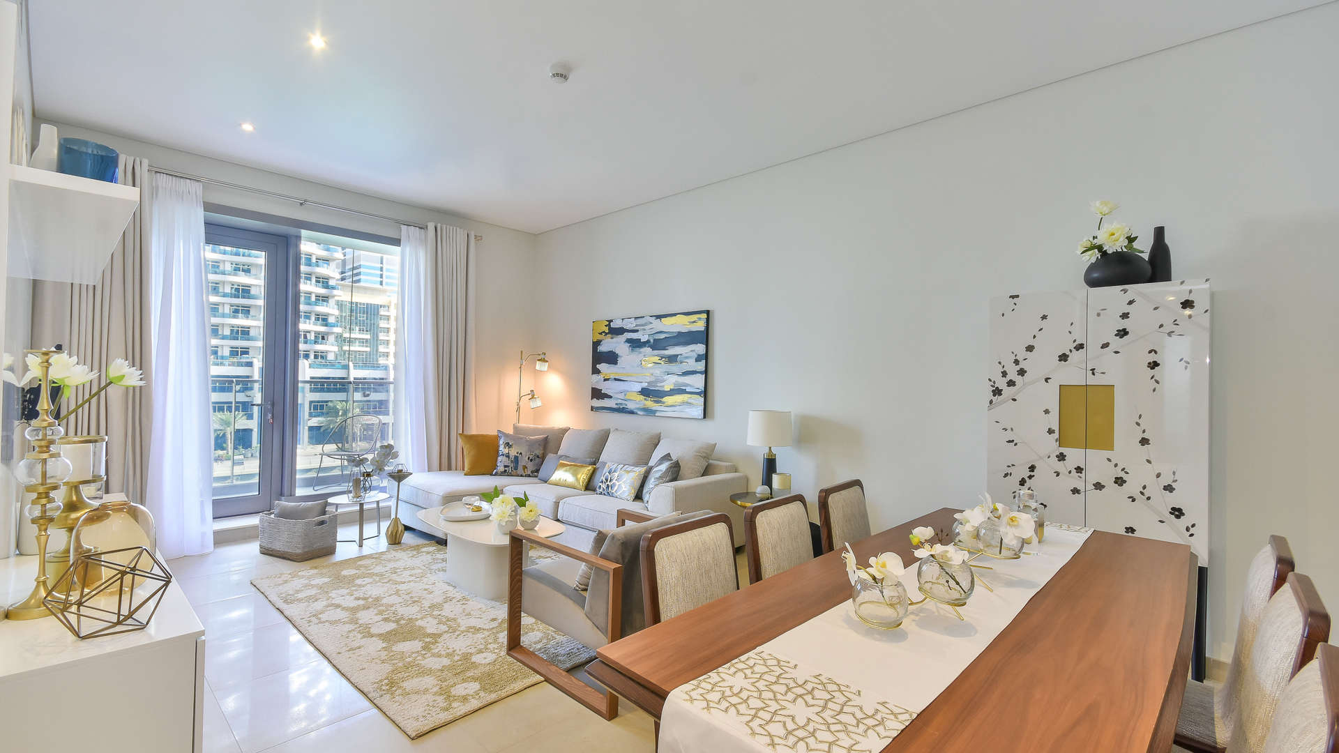 Luxurious living and dining area in 3-bedroom apartment, Sparkle Towers, Dubai Marina