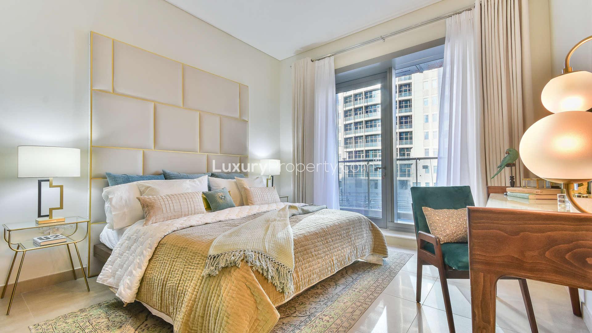 Luxurious bedroom in 2-bedroom apartment, Sparkle Towers, Dubai Marina, with elegant decor and view