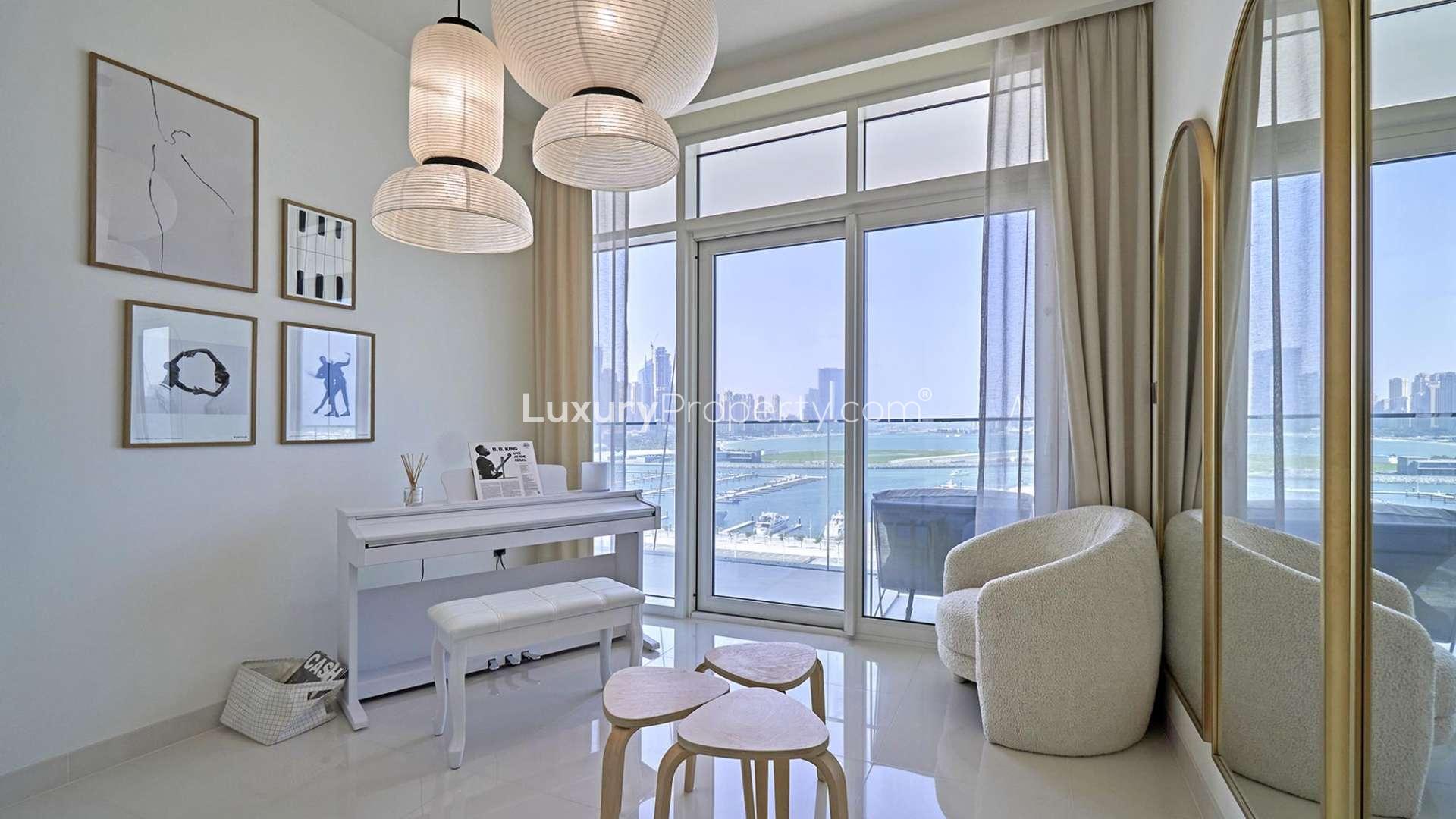 Modern open-plan kitchen and living area in Emaar Beachfront apartment, Dubai Harbour