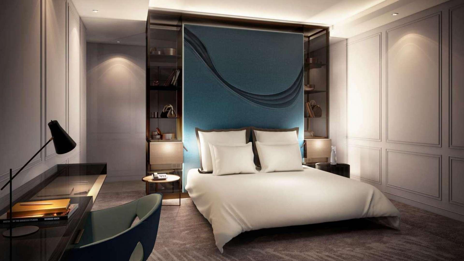 Elegant bedroom in Downtown Dubai apartment, The Address Residences, with modern decor and lighting