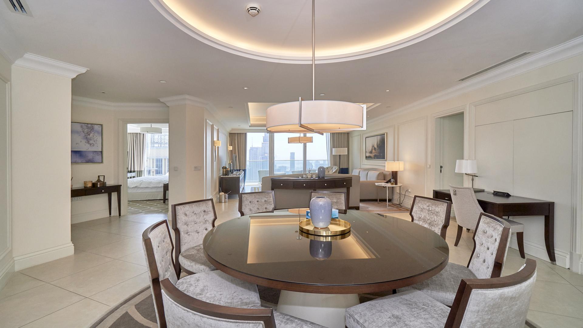 Luxurious downtown Dubai apartment living room with city view, modern furnishings, and elegant decor