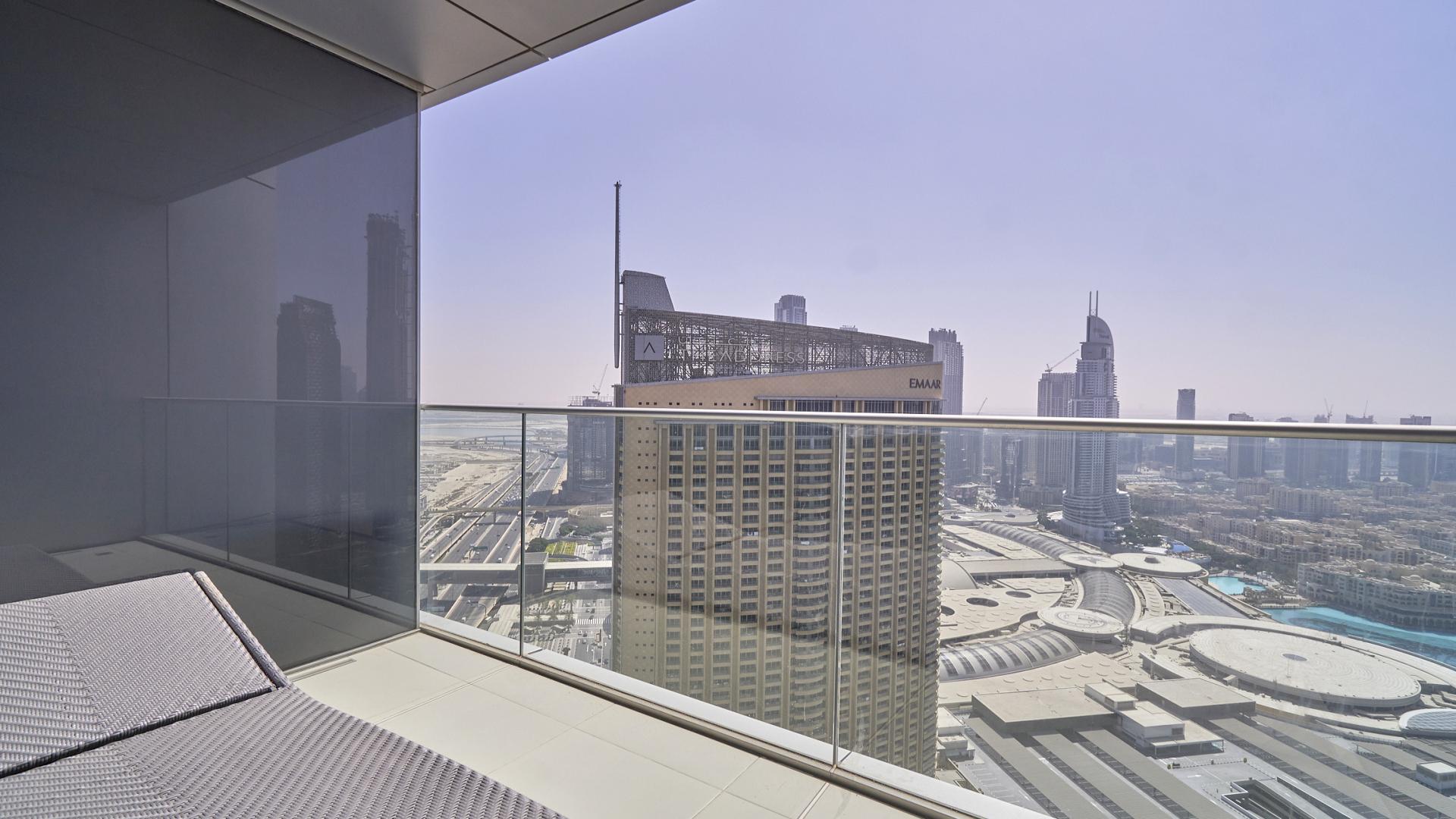 Luxurious living room in Downtown Dubai apartment with stunning city view and elegant decor