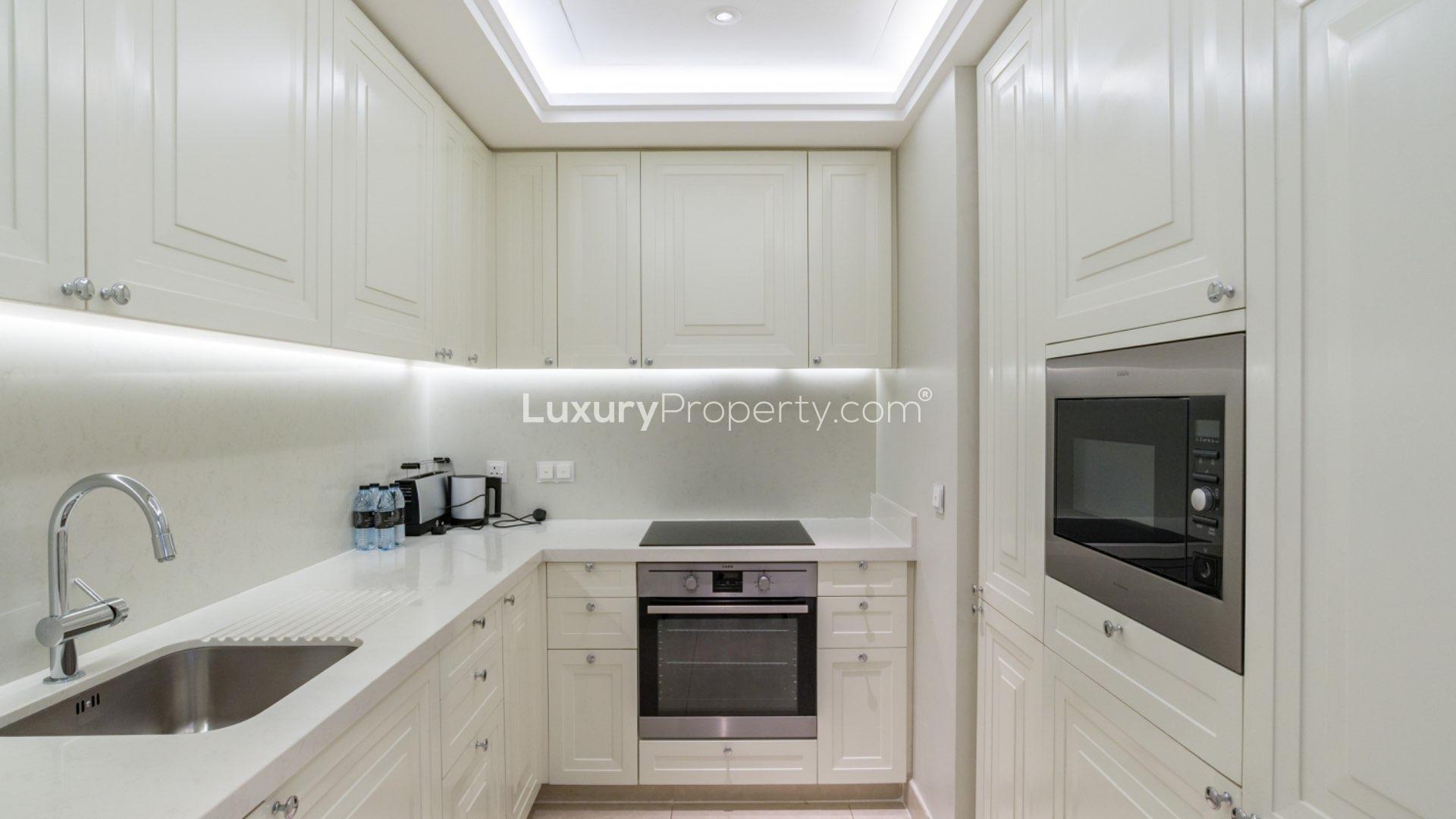 Luxurious living room in 3-bedroom apartment, The Address The BLVD, Downtown Dubai skyline view