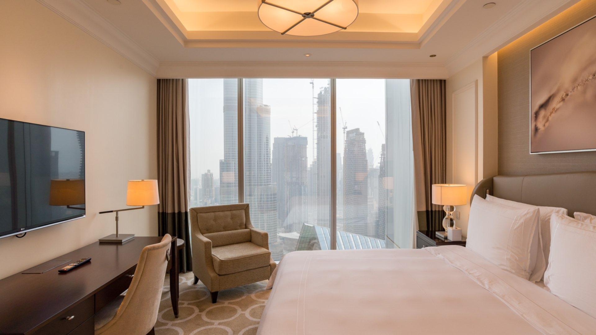 Luxurious bedroom with city view in Downtown Dubai apartment for sale