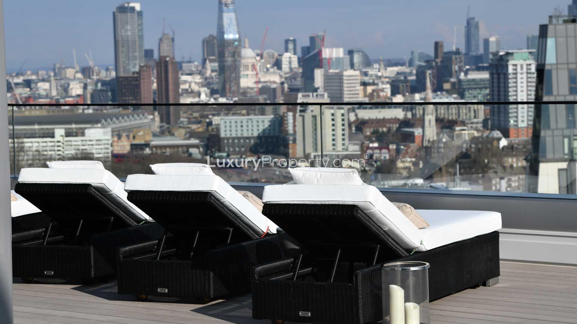 Aerial view of London skyline near The Corniche, featuring iconic landmarks and Thames River