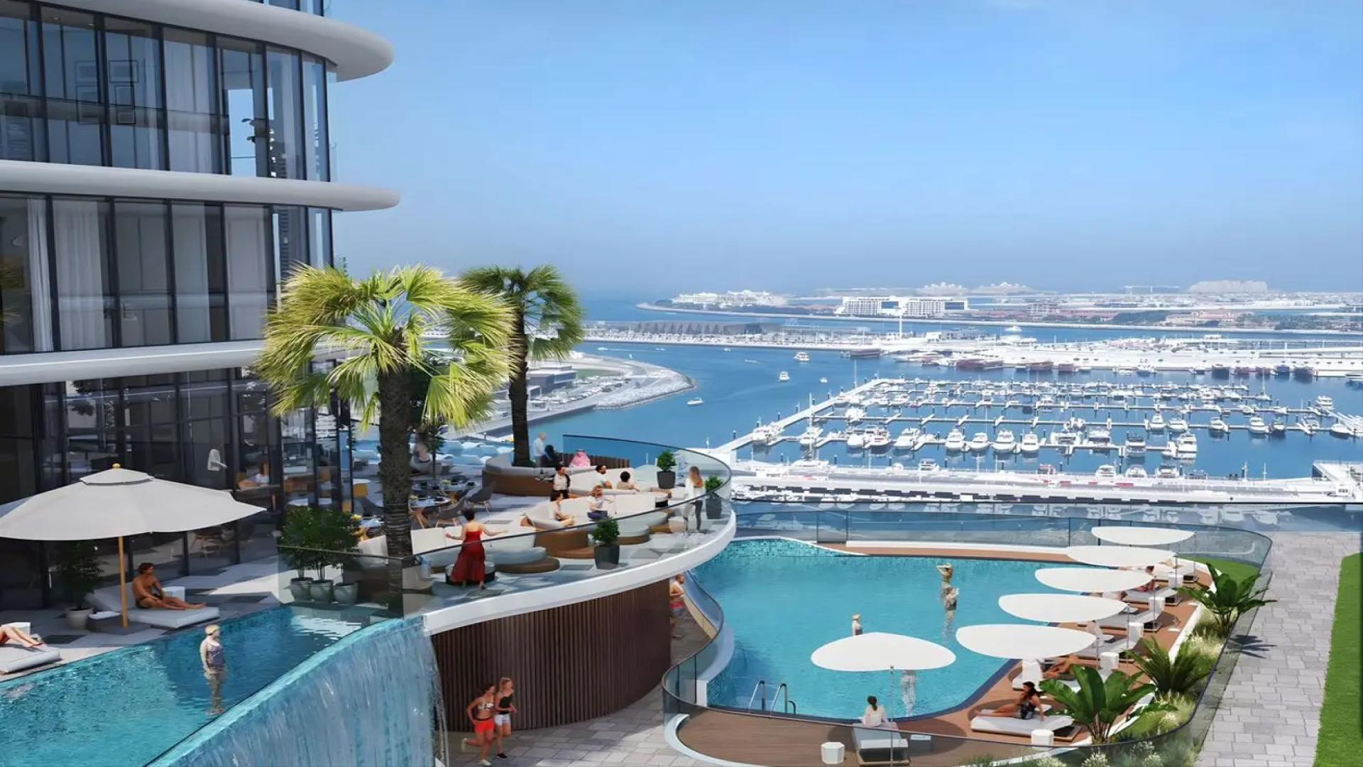 Luxurious pool area at Sobha Seahaven apartment in Dubai Harbour, featuring modern amenities