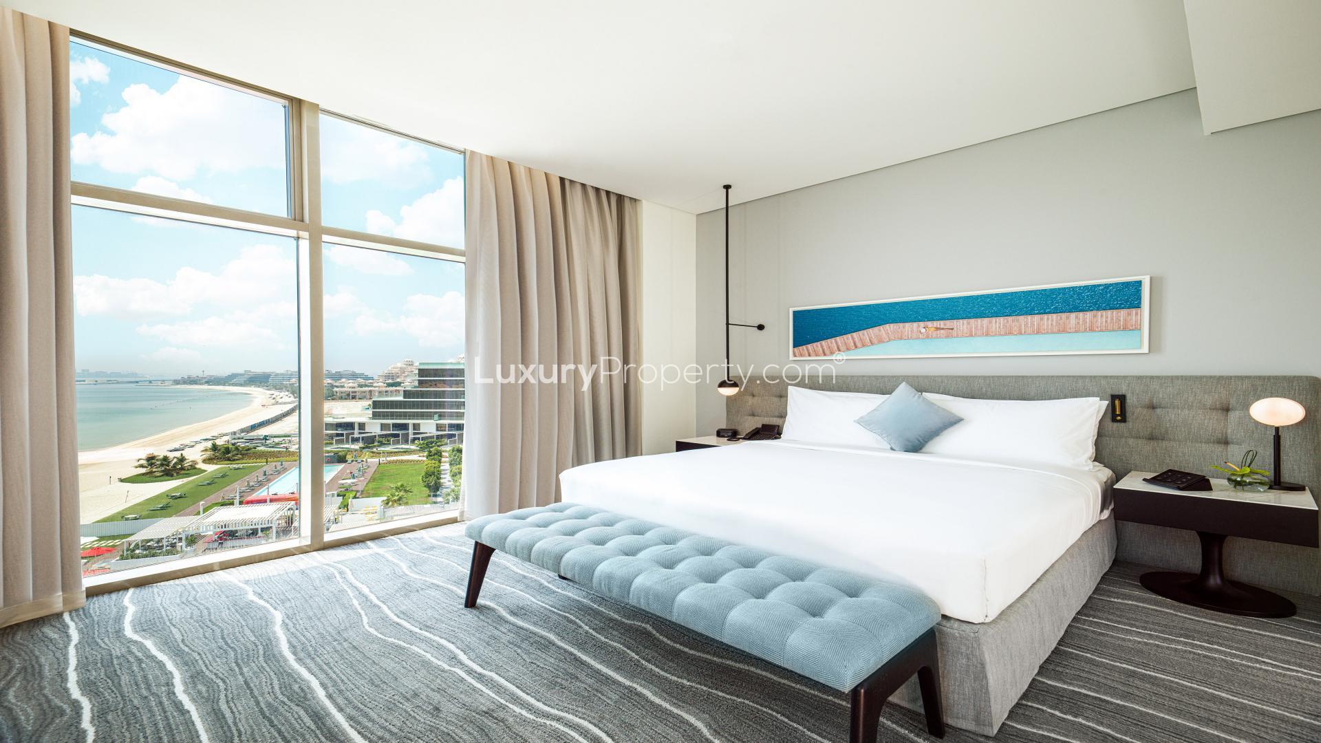 Dining and living area in fully furnished Palm Jumeirah apartment with modern decor